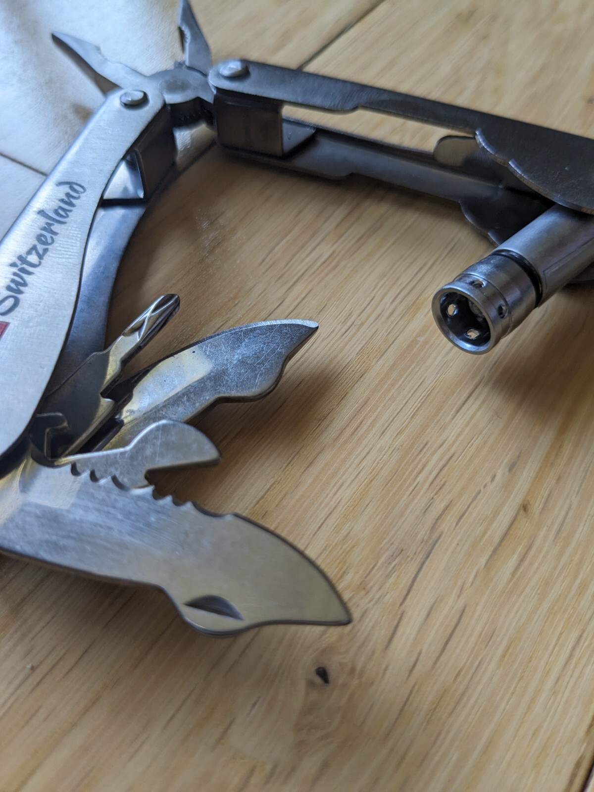 Swiss-Made Foldable Pocket Multi-Tool Stainless Steel w Pocket Clip. 8 Functions