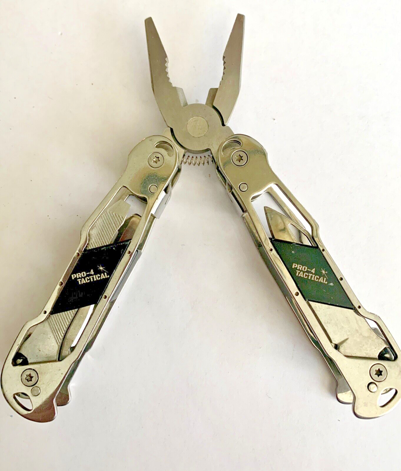 PRO-4 POWER TACTICAL 12-IN-1 MULTI-TOOL PLIERS, CHROME TONE METAL & BLACK