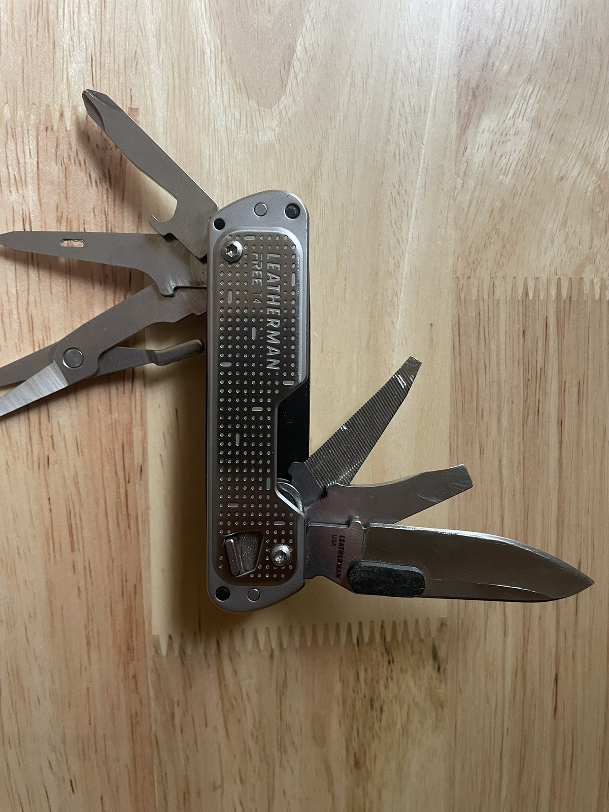 Leatherman Custom Free T4 Multi-Tool w/inserts for Victorinox Scale Tools