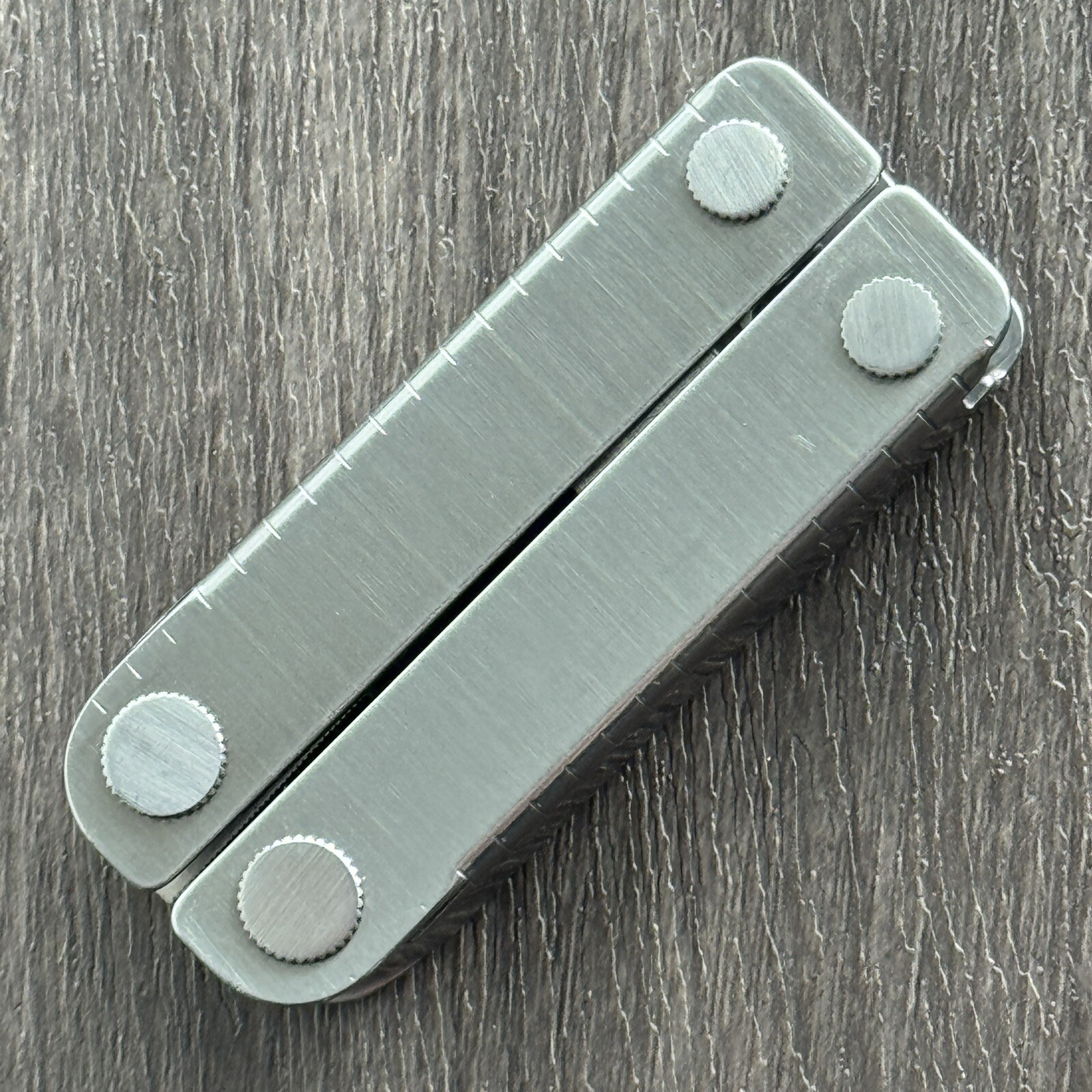 Leatherman MINI TOOL multitool. Variant w/US PAT 4744272 and a Blank side