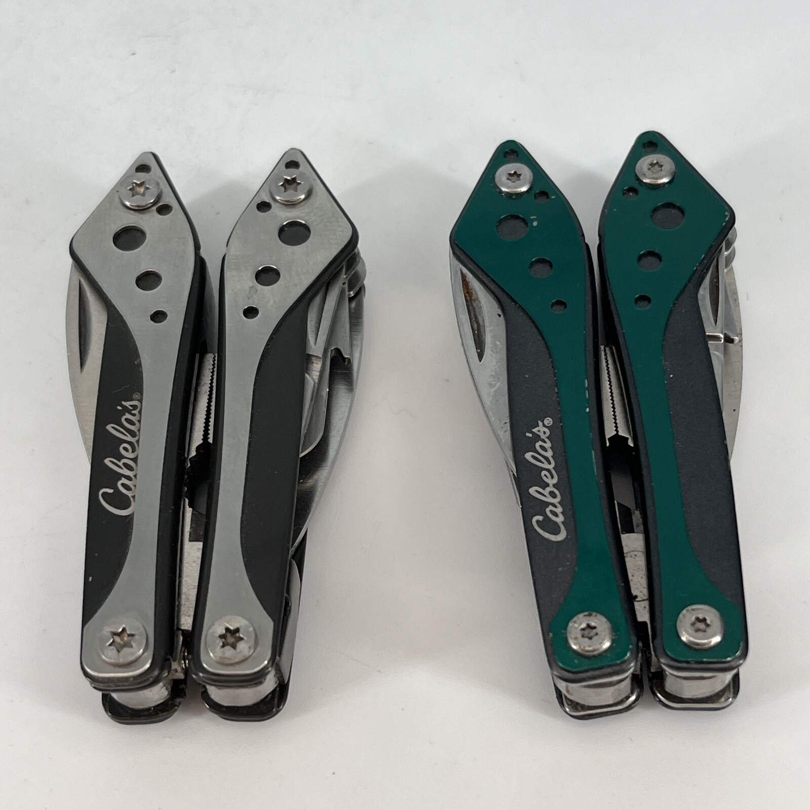 LOT OF 2 Cabela’s SILVER & GREEN Mini Multi-Tool Spring Open Pliers Scissors Saw