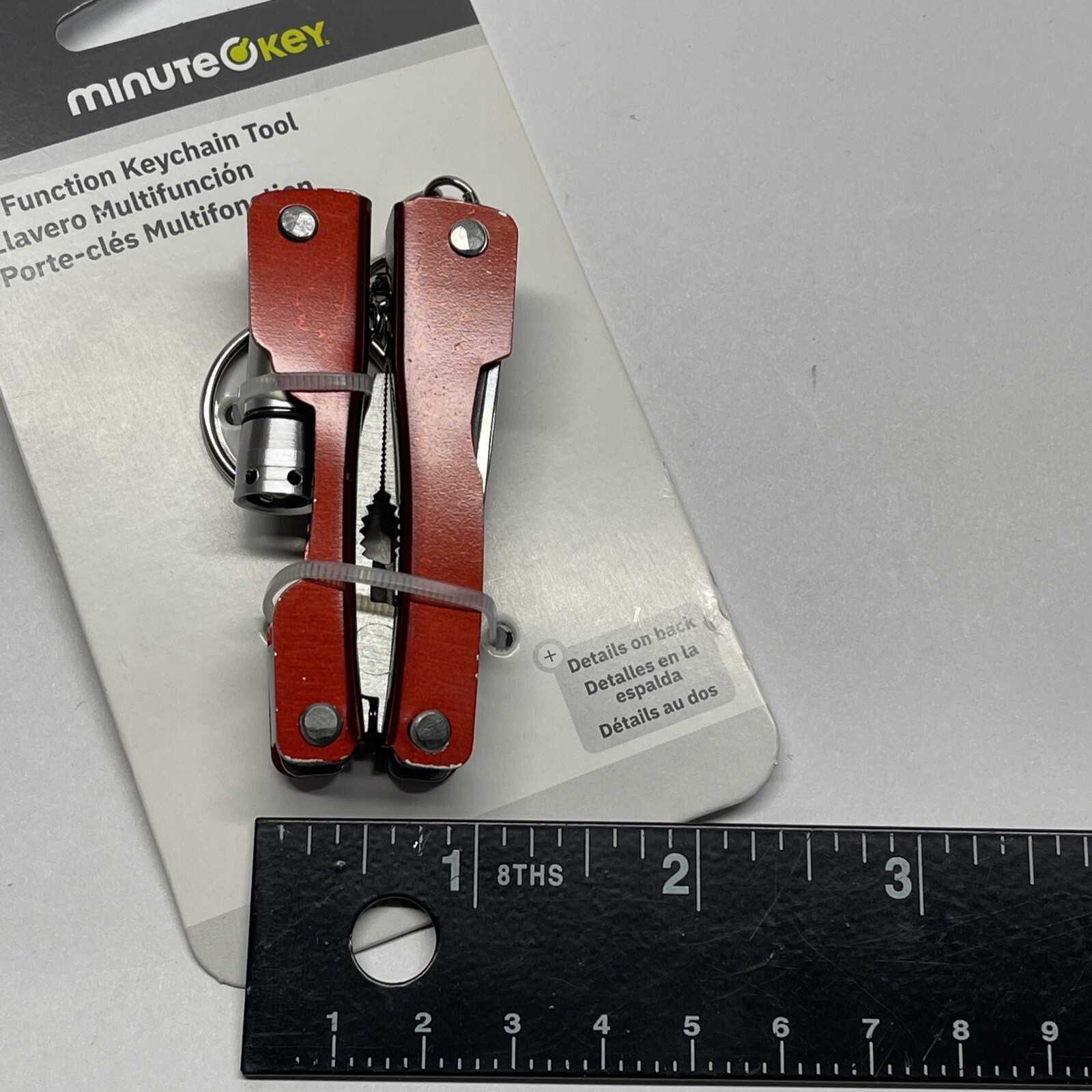 Key Chain Tool 7 Function Pliers Wire Knife Screwdriver Can Opener LED Light Red