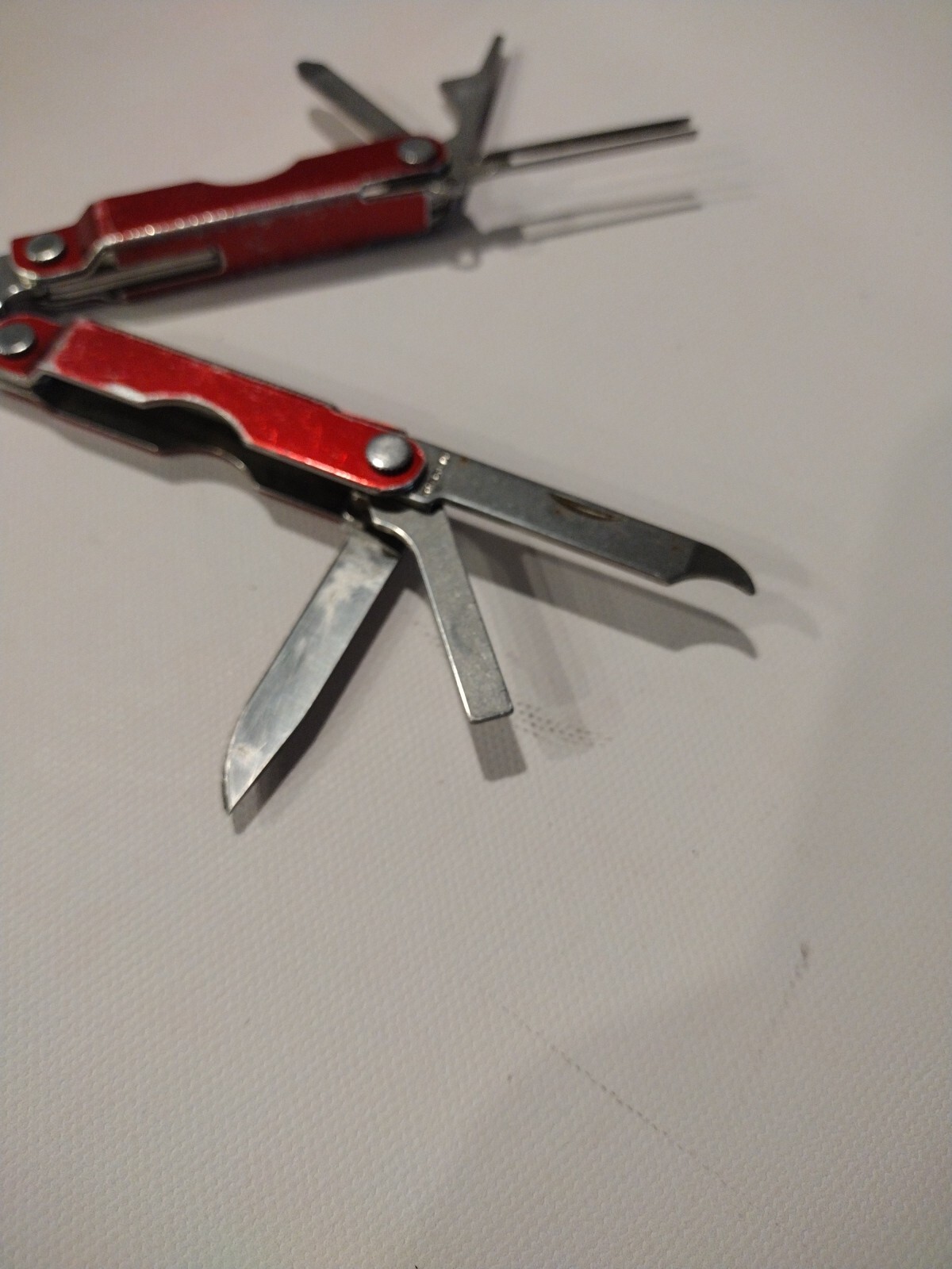 Leatherman Micra Multi-Tool, Knife, Scissors, Key Ring, Red Color in Good Condit