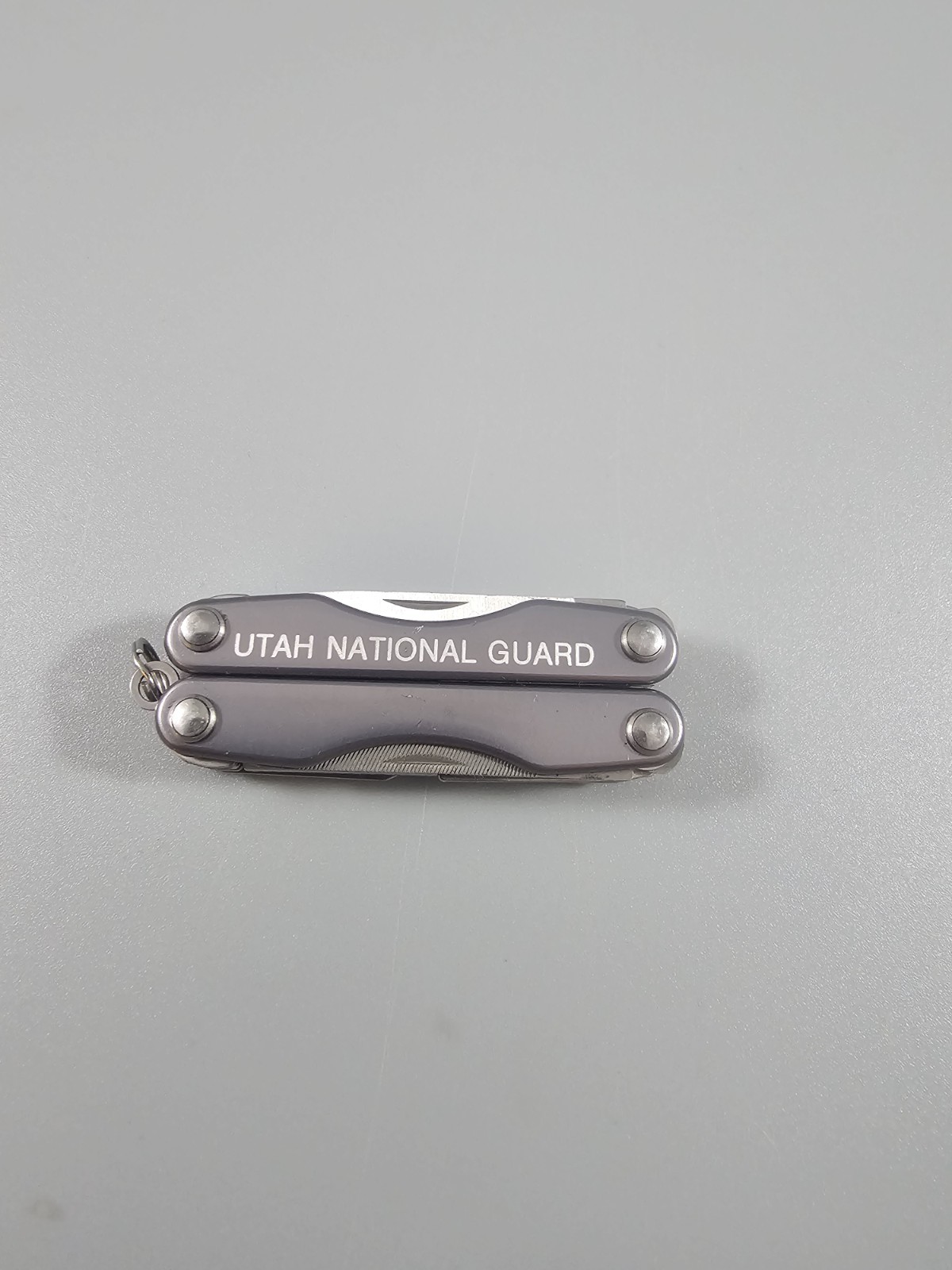 Leatherman Squirt P4 UTAH NATIONAL GUARD Gray Multi-tool Knife – Very Clean