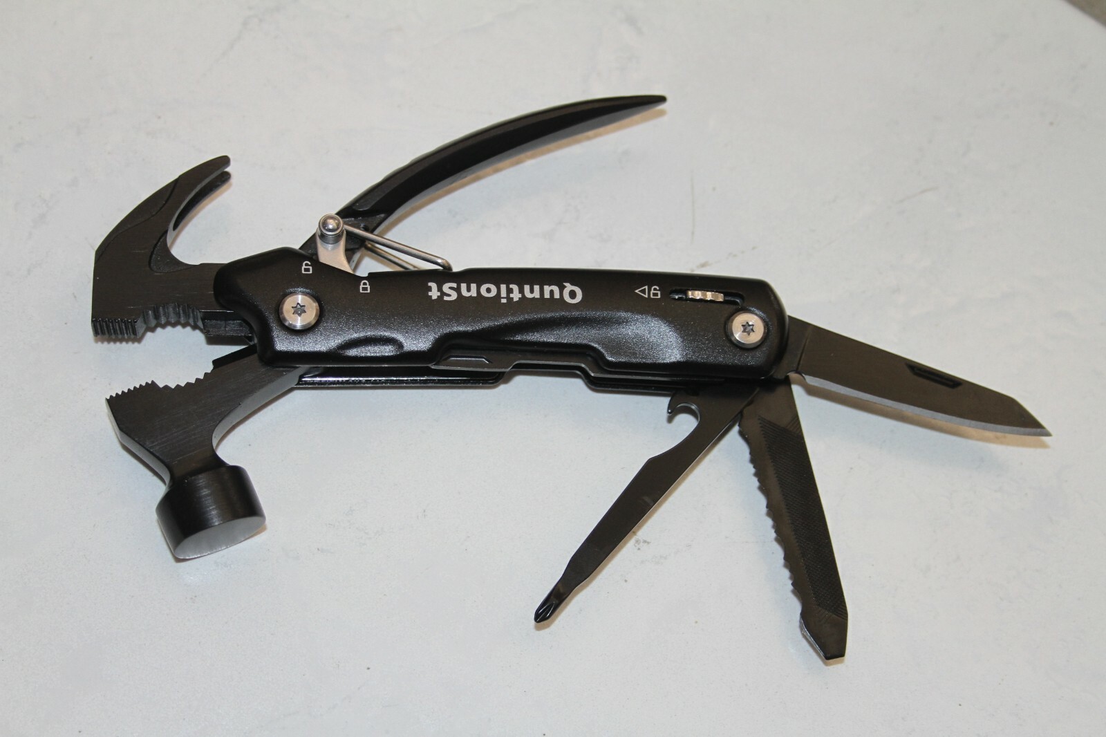 Quntionst Multitool a Smart Compact Survival Kit Hammer Pliars Saw Knife