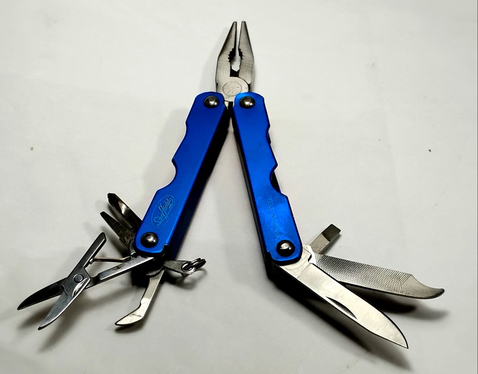 Sheffield Multitool Blue Handle Pliers Sissors, nail file, knife– Near Mint