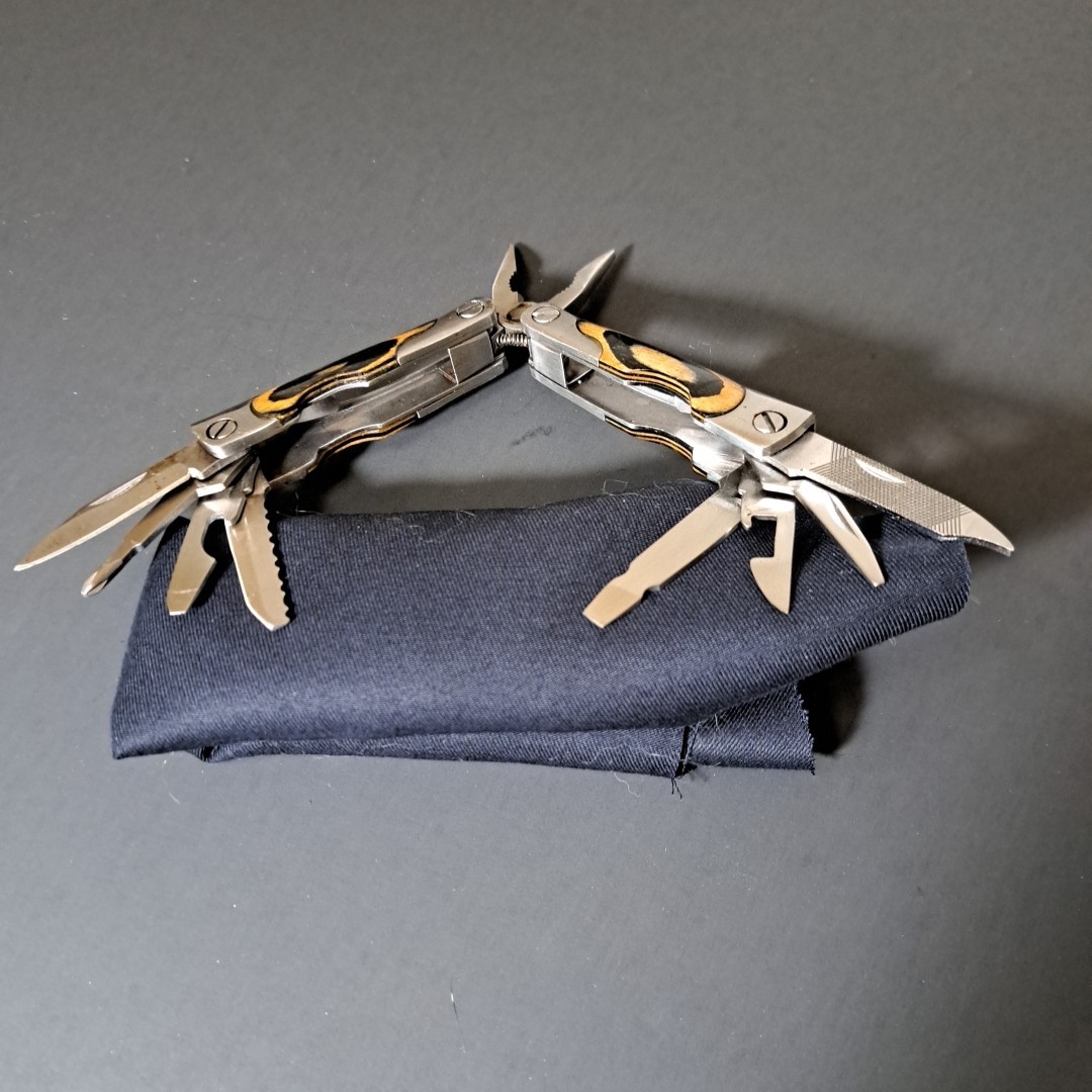 Multi tool With Laminated Wood Handles, Clean