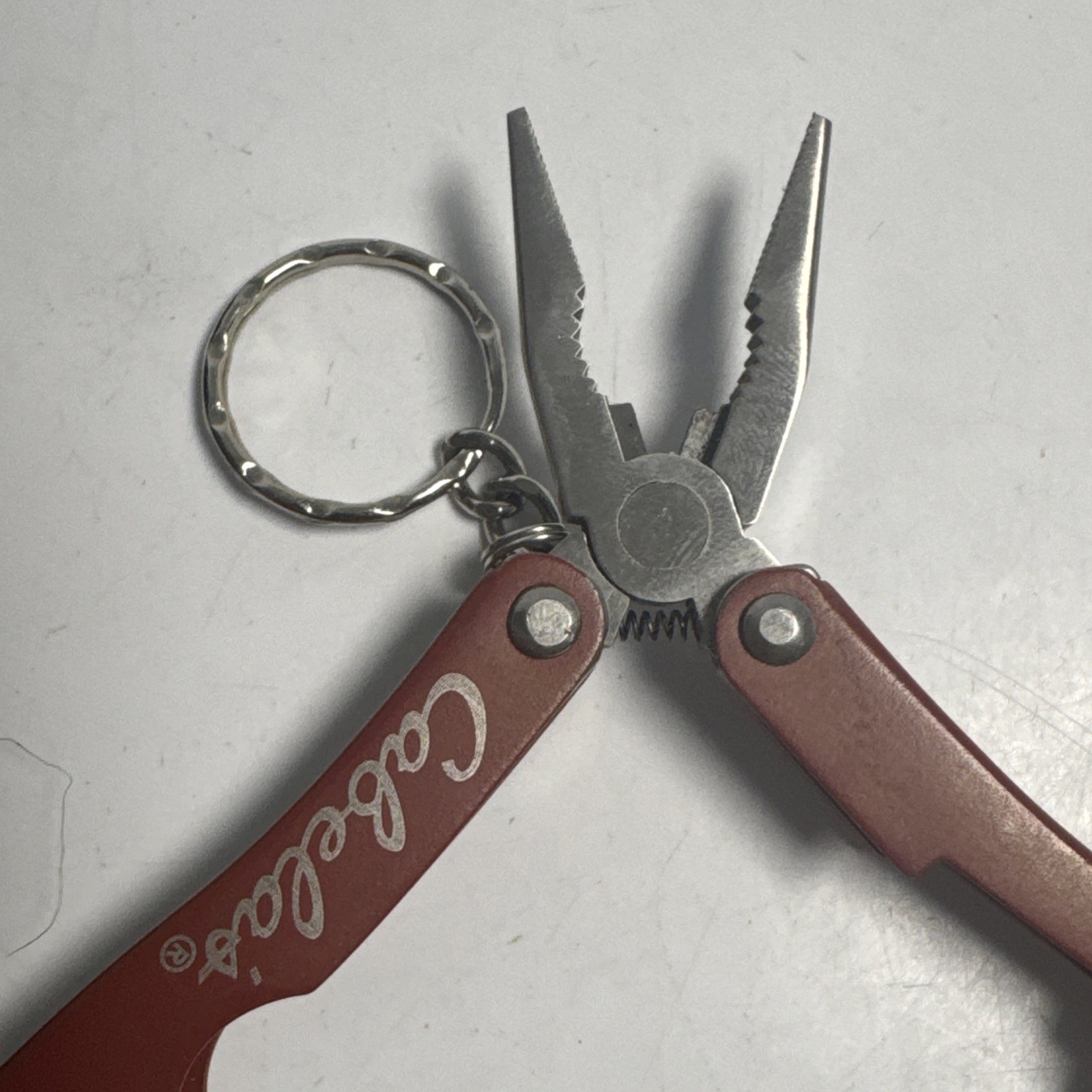 Cabelas Pocket Multi-Tool Flashlight Serrated Knife Can Opener Key chain Pliers