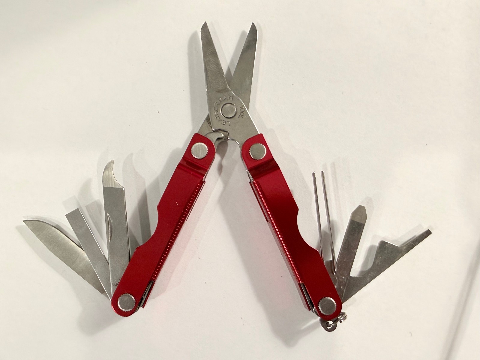 LEATHERMAN MICRA RED METALLIC MULTI-TOOL – ADVERTISEMENT LEXUS