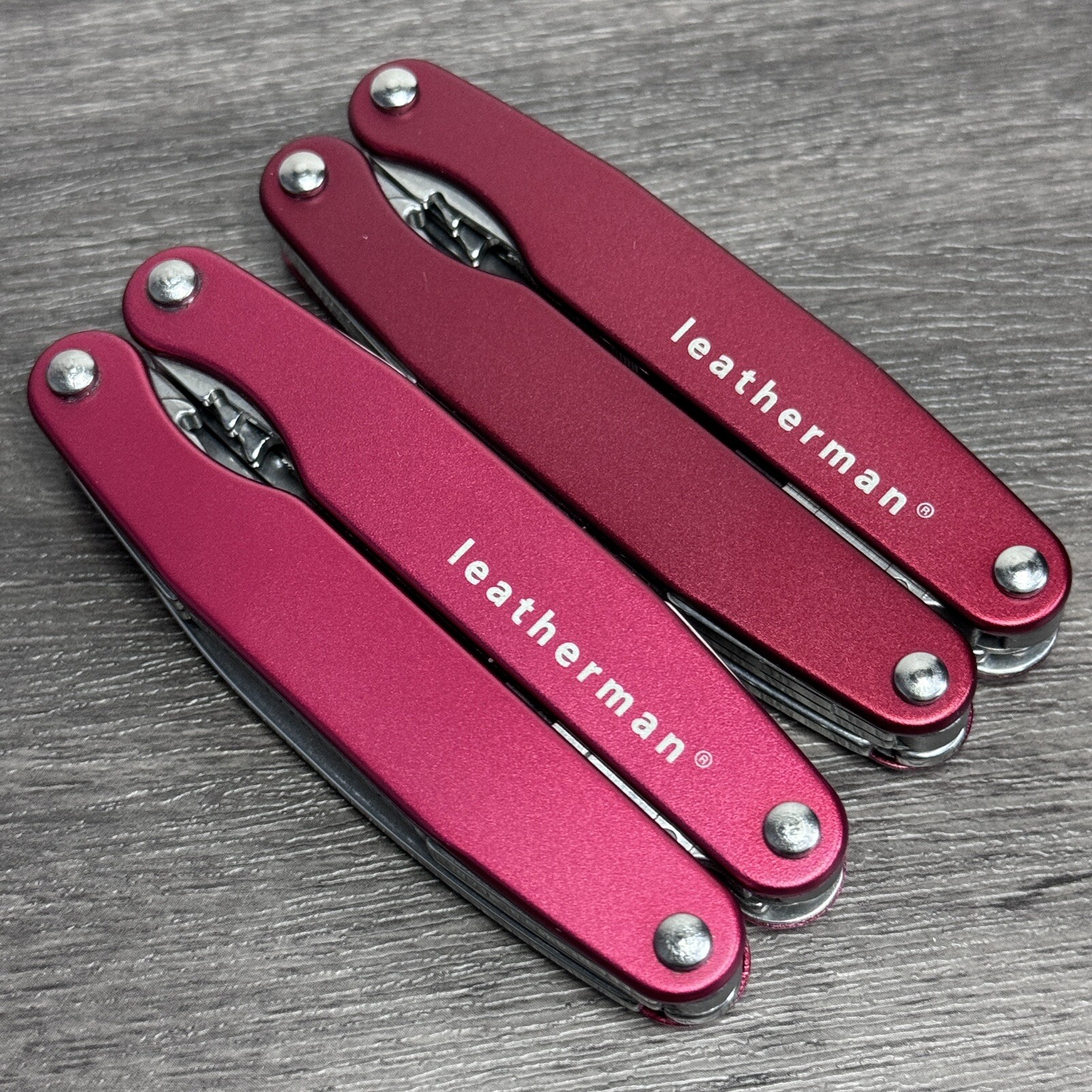 TWO Leatherman Juice C2 Red multitools. TM variants. Discontinued