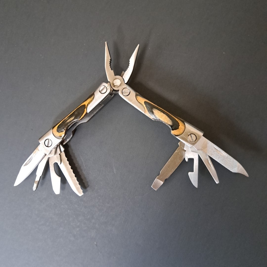 Multi tool With Laminated Wood Handles, Clean