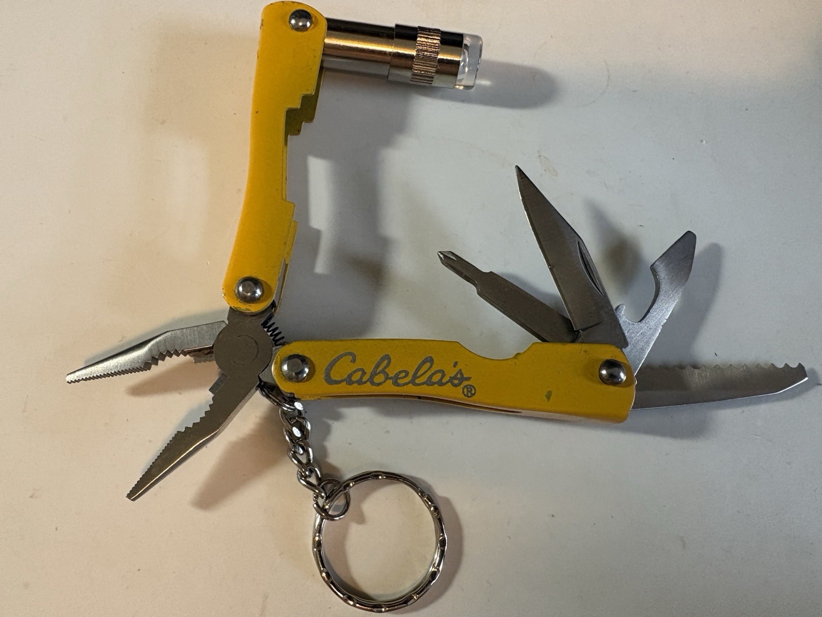 3-BRANDEDMulti-Tool with 9 Tools – Pliers Cutters Opener Flat Head Scissors L-RM