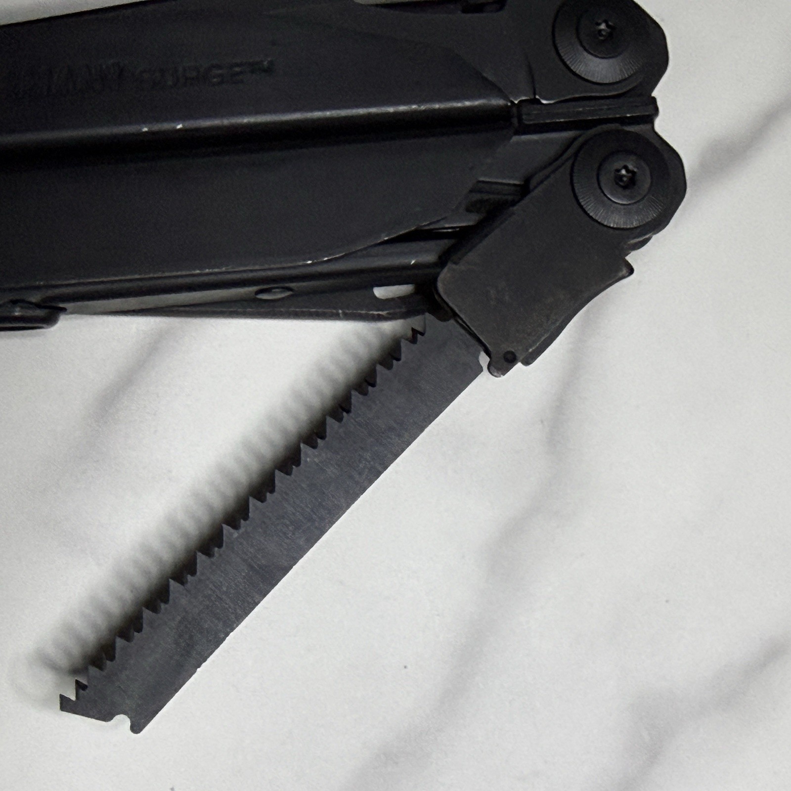 Leatherman Surge Cap Crimper Black Multitool w/Molle Sheath. Discontinued