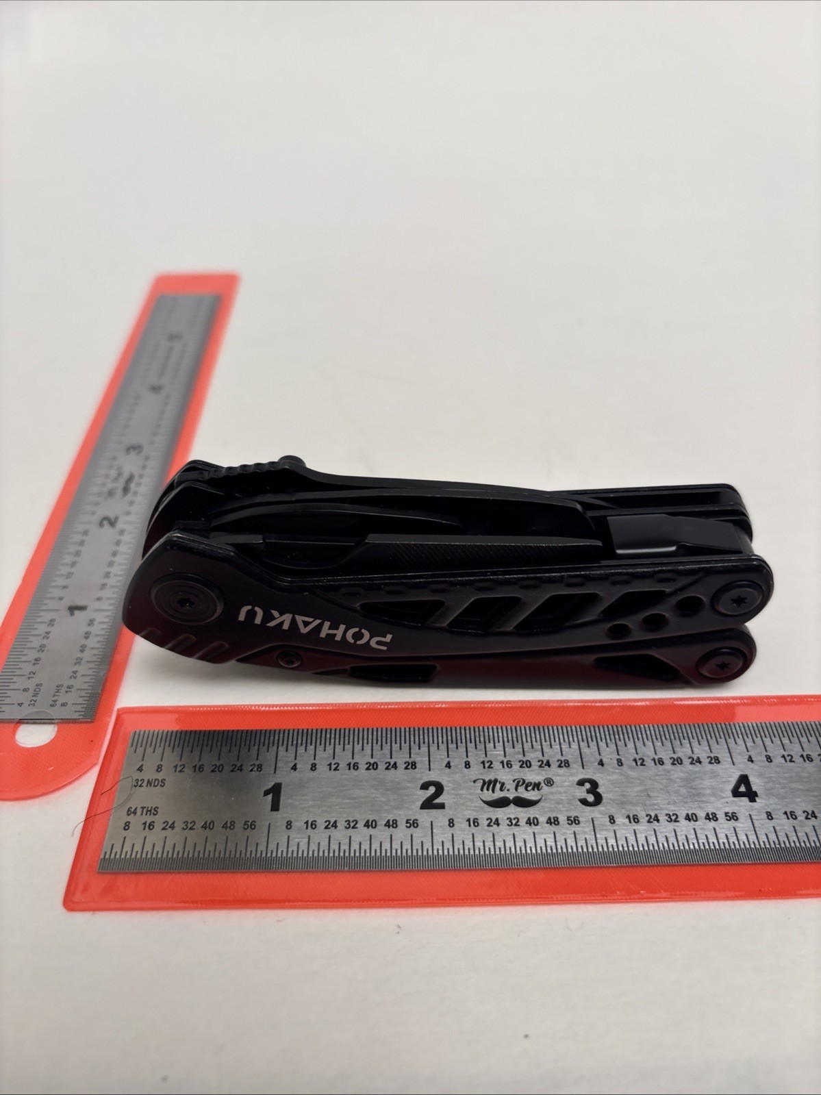 POHAKU BLACK MULTI-TOOL WITH PLIERS, KNIFE, SAW, FILE, SCREWDRIVERS