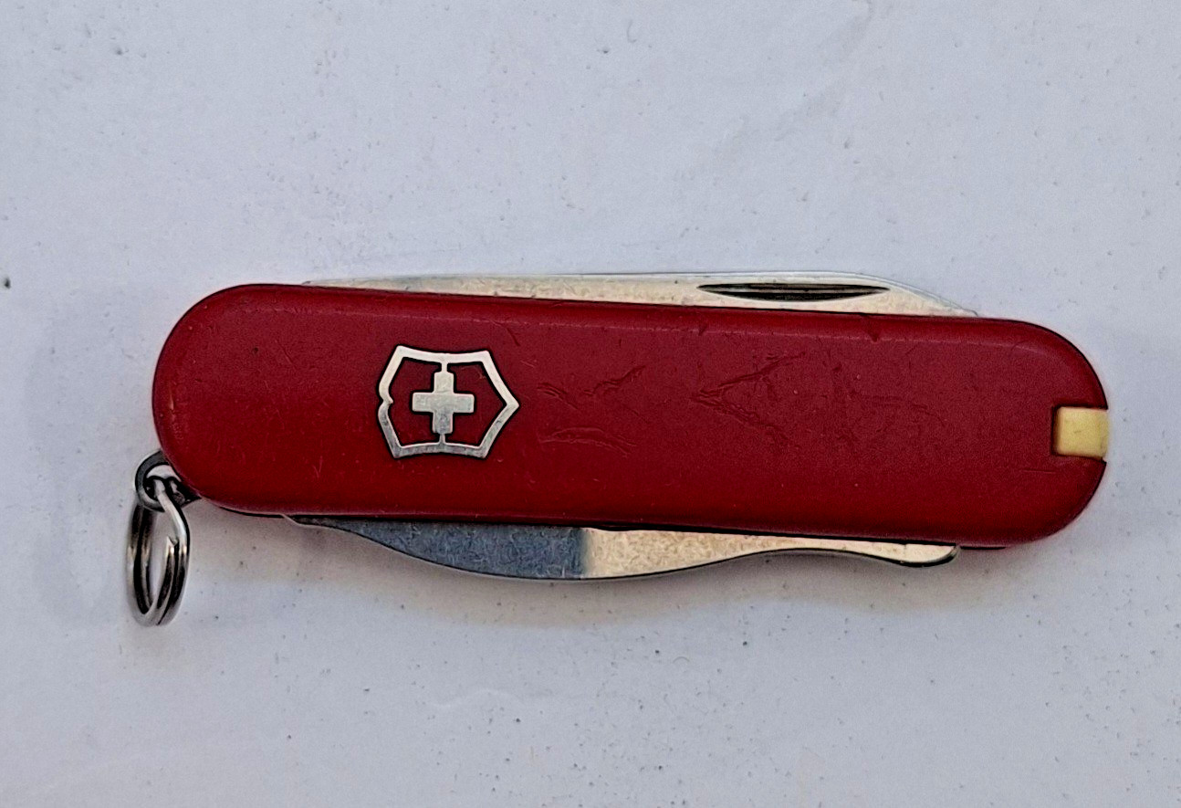 Set of Five Multitools, Many Functions, Includes a Victorinox Swiss Made