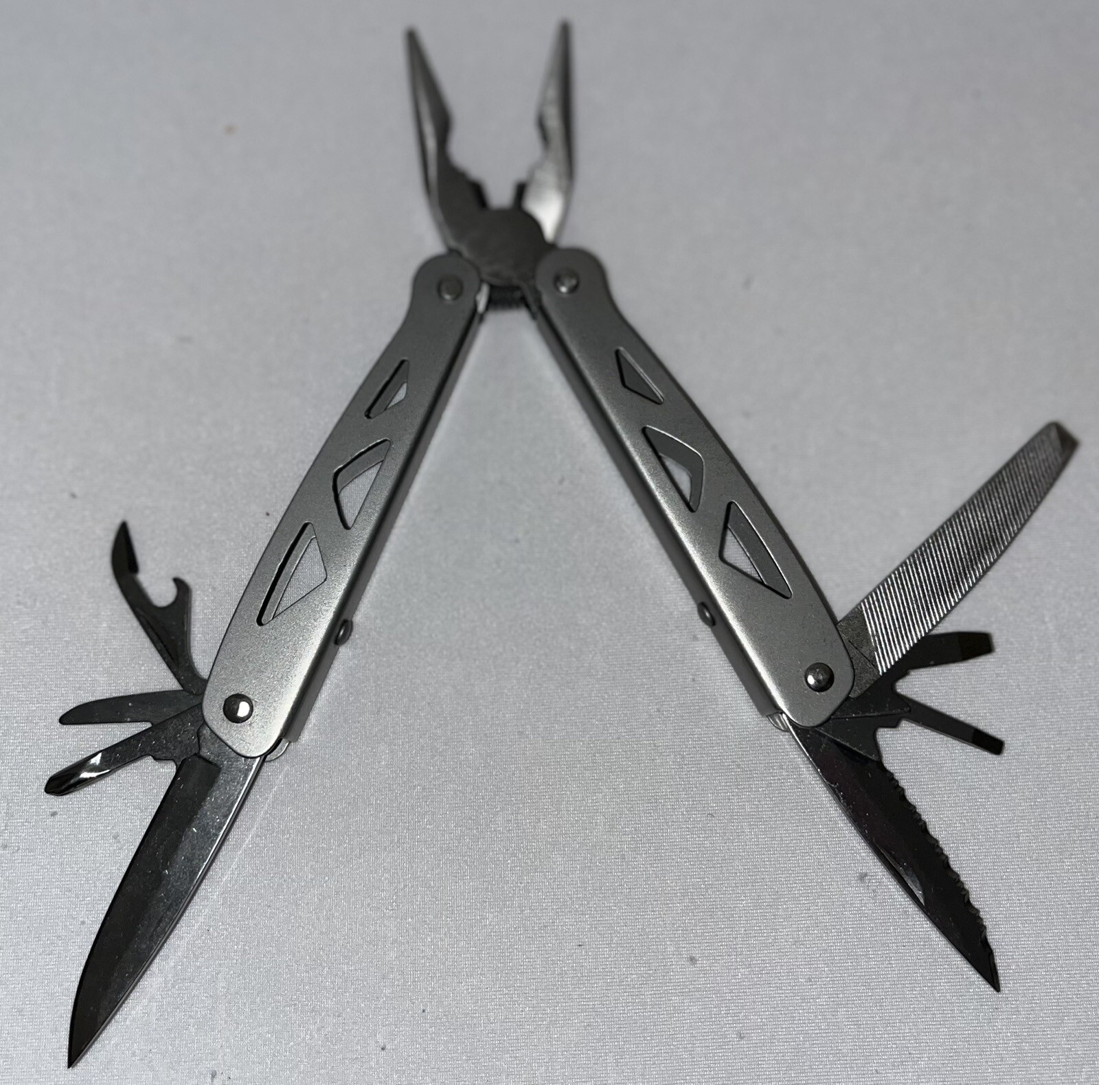 Ozark Trail Camping Stainless Steel 12-In-1 Multi Tool with Sheath in Silver