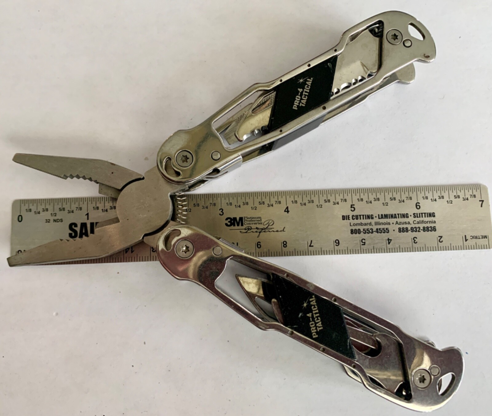 PRO-4 POWER TACTICAL 12-IN-1 MULTI-TOOL PLIERS, CHROME TONE METAL & BLACK