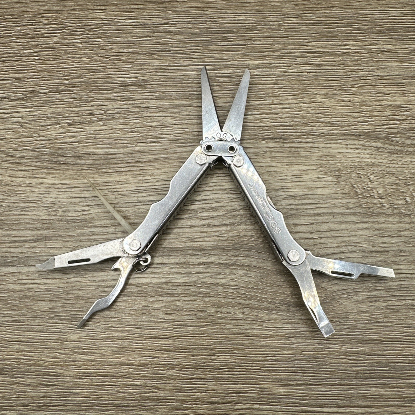 SOG Crosscut Stainless Steel Multi-Tool. 8 Tools Total