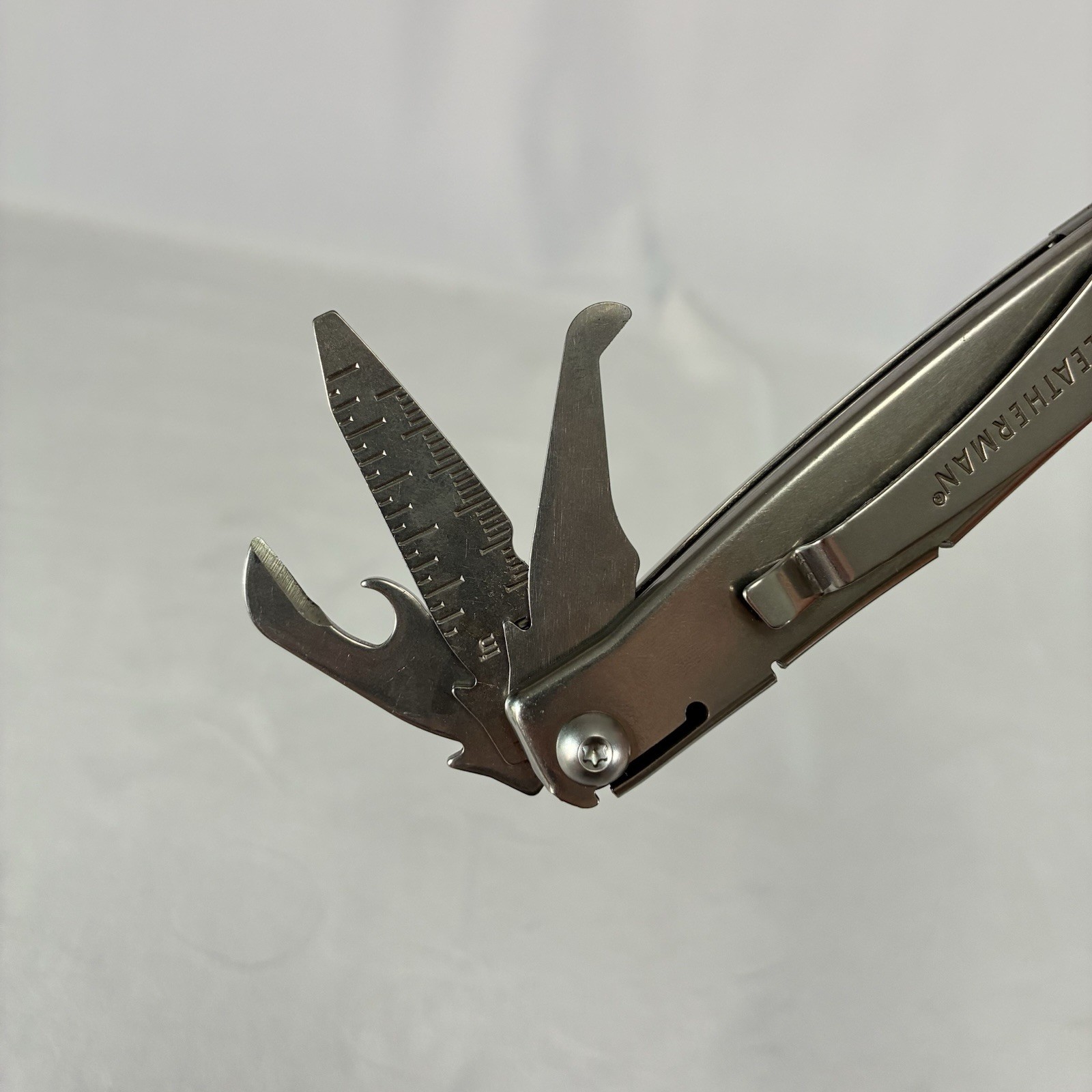 Leatherman Rev Stainless Steel 14-Tool Multi-Tool Pocket Knife w/ Pocket Clip