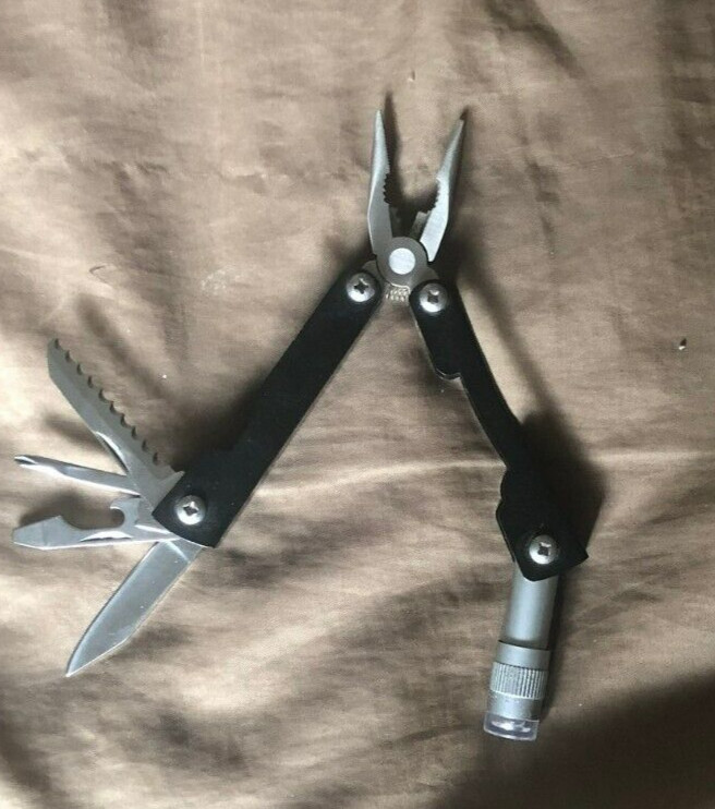NEW Ozark Trail 8 in 1 Multi Tool with Flashlight, Knife, Pliers, Saw, More!