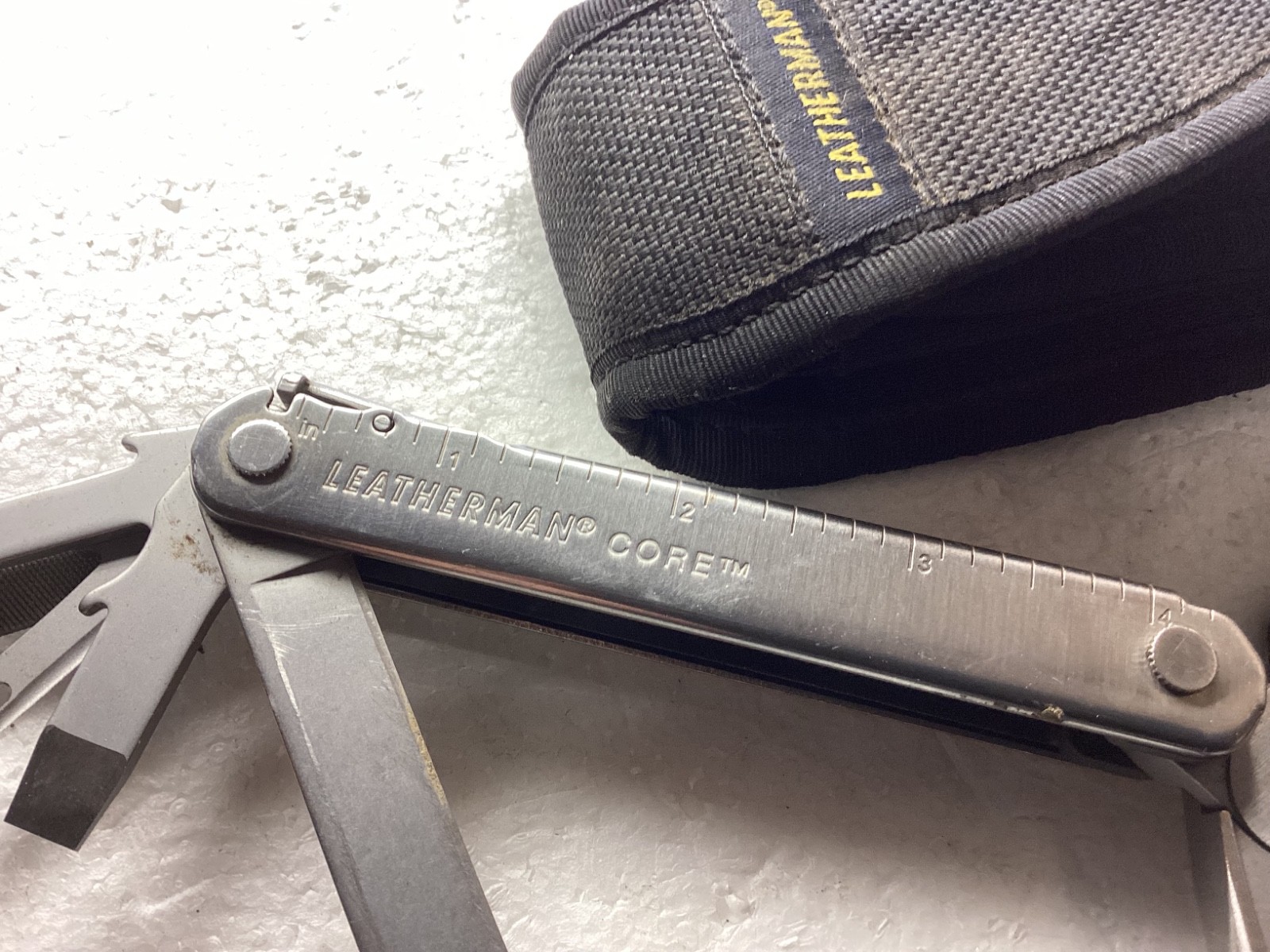 VINTAGE LEATHERMAN CORE MULTITOOL with nylon case.