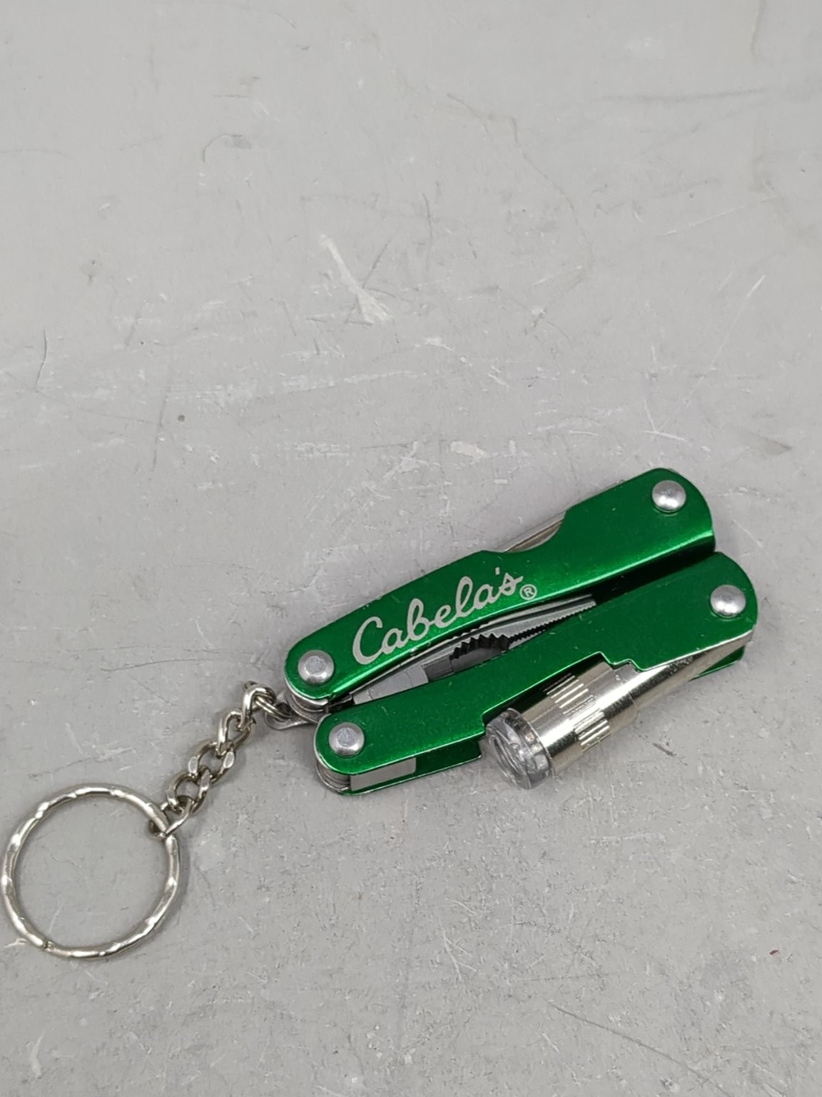 Cabela’s Green Multi-Tool with LED Light Pliers Knife Keychain * Needs Battery *
