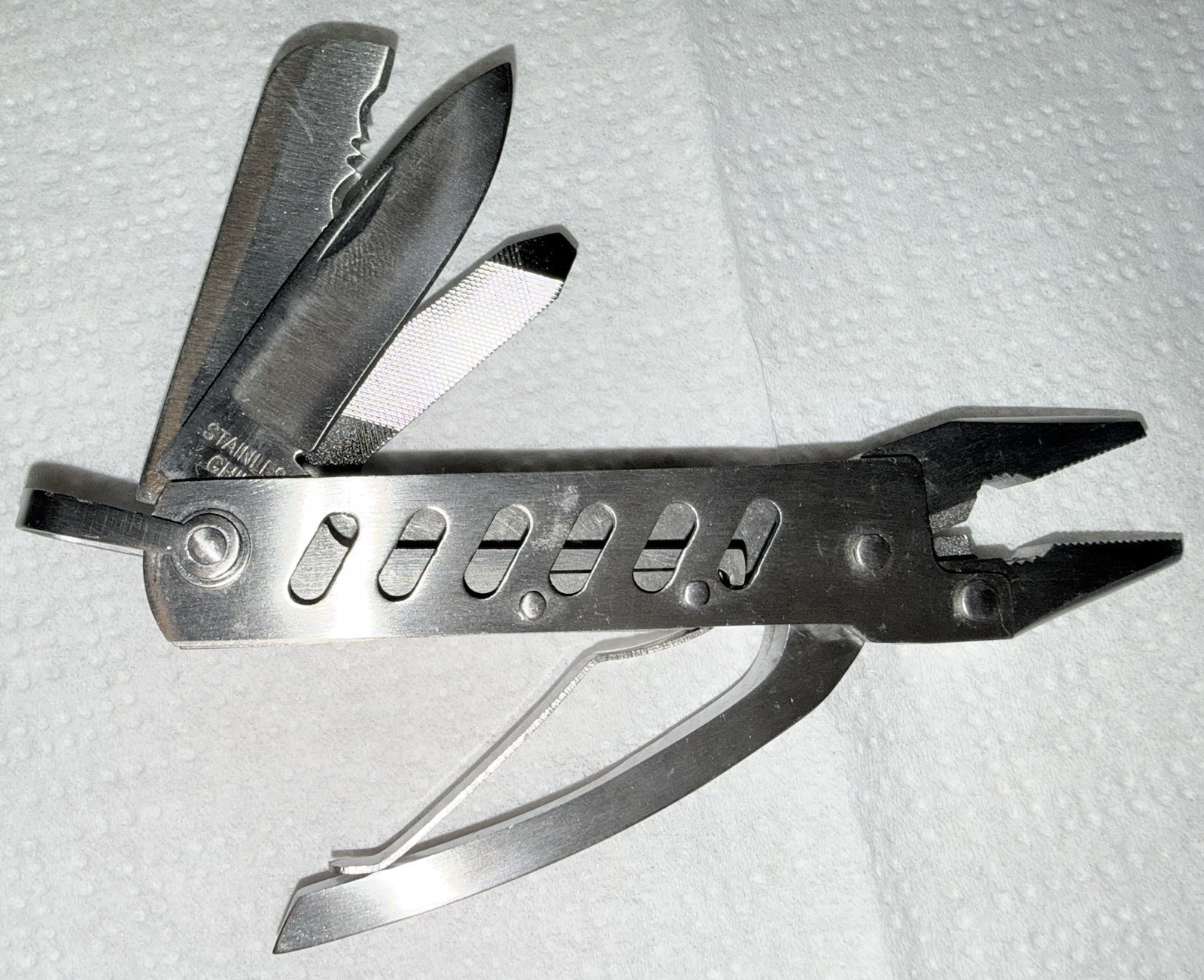 Knife, Classic Multi-tool. Pliers. Wire Cutter. Blade. Saw And More. Nylon Case