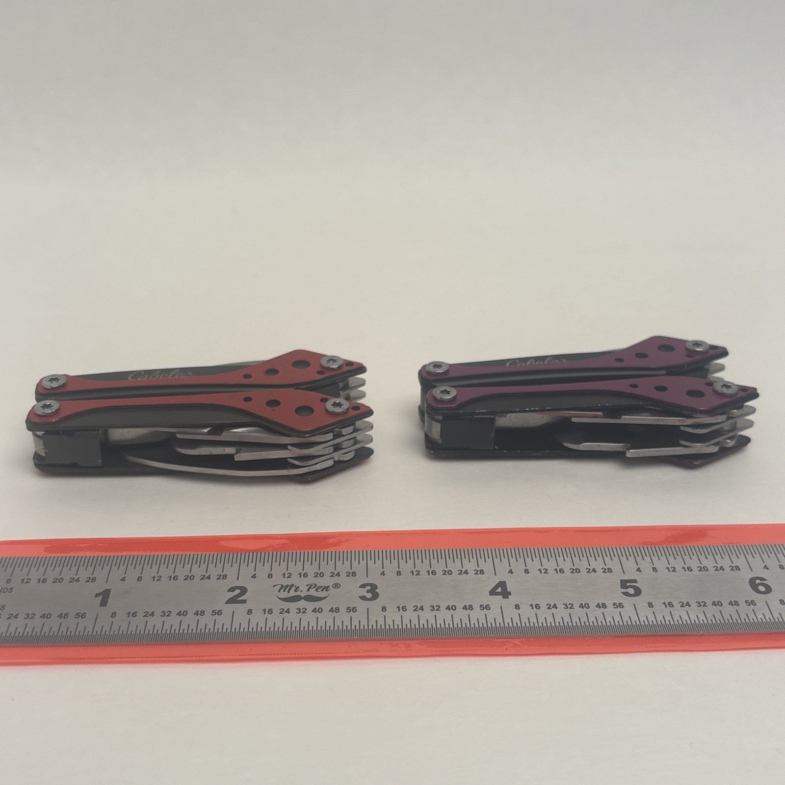 Cabela’s Lot Of 2 Purple Red 7-in-1 Small MultiTool Camp Hunt Fish Hike EDC