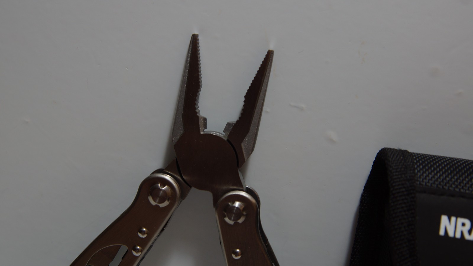 NRA‑ILA Stainless Multi‑Tool w/ Spring Pliers & Hard Form‑Fitted Nylon Pouch