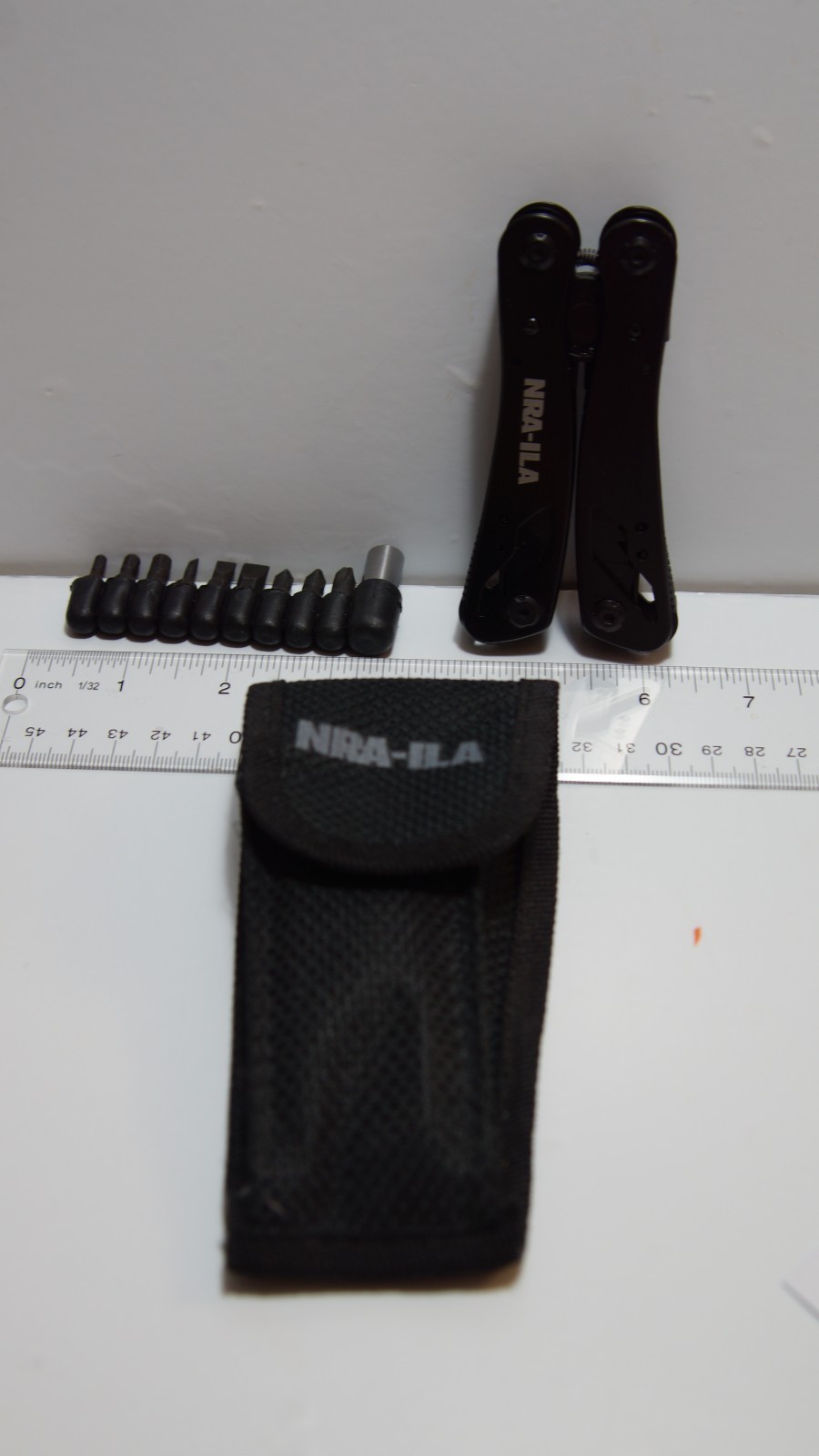 NRA‑LIA Black Multi‑Tool w/ Bits & Nylon Sheath – Knife Saw Pliers Set