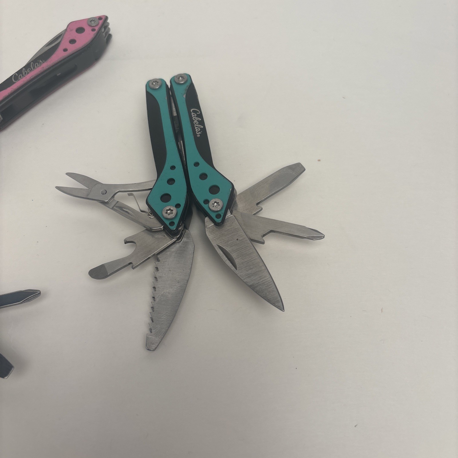 Cabela’s LOT of 4, Orange Teal Silver Pink Small Multi-Tool Camp Hike Hunt Fish