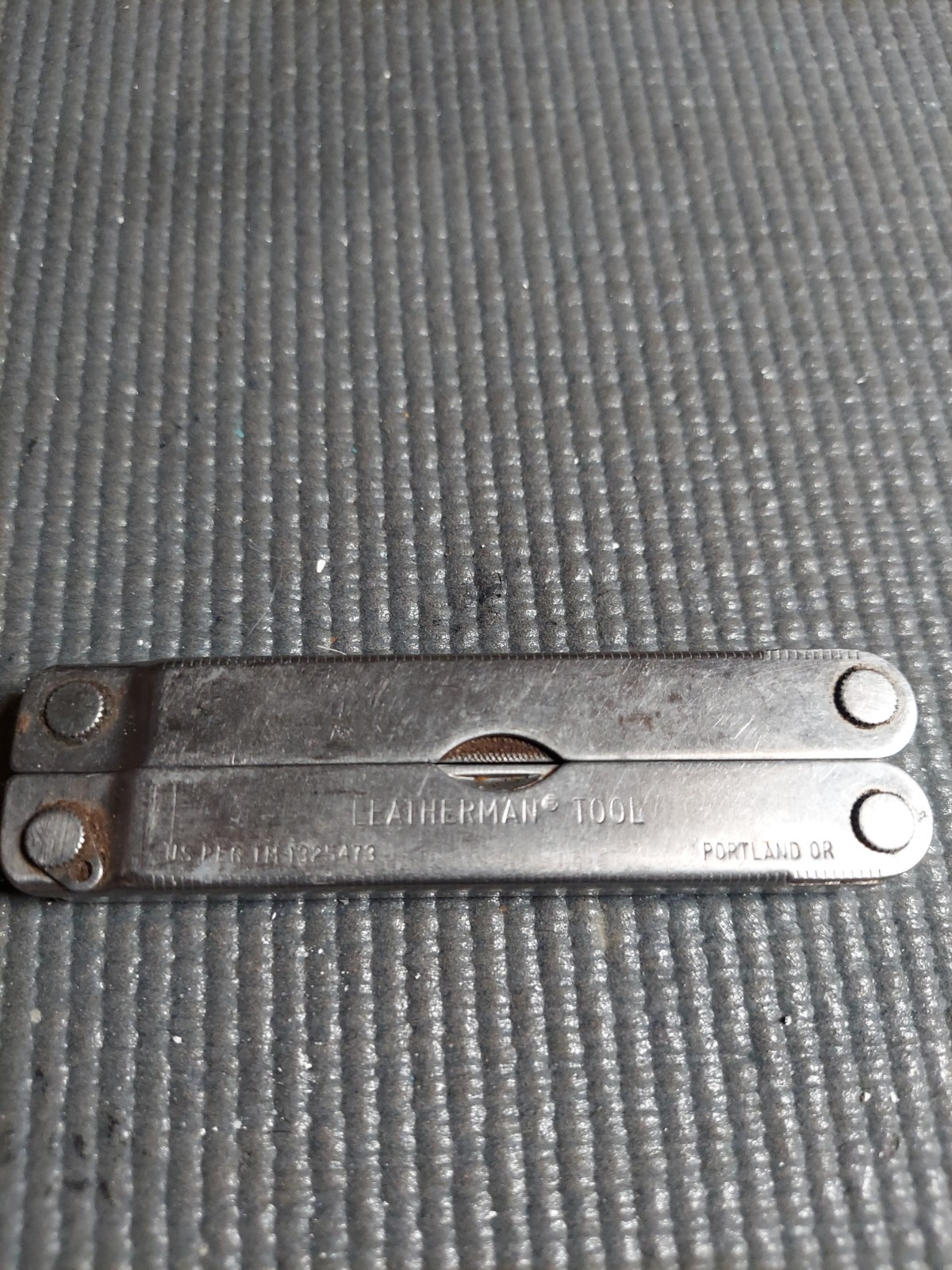 Original vintage Leatherman multi-tool, U.S. registered trademark (TM 1325473).
