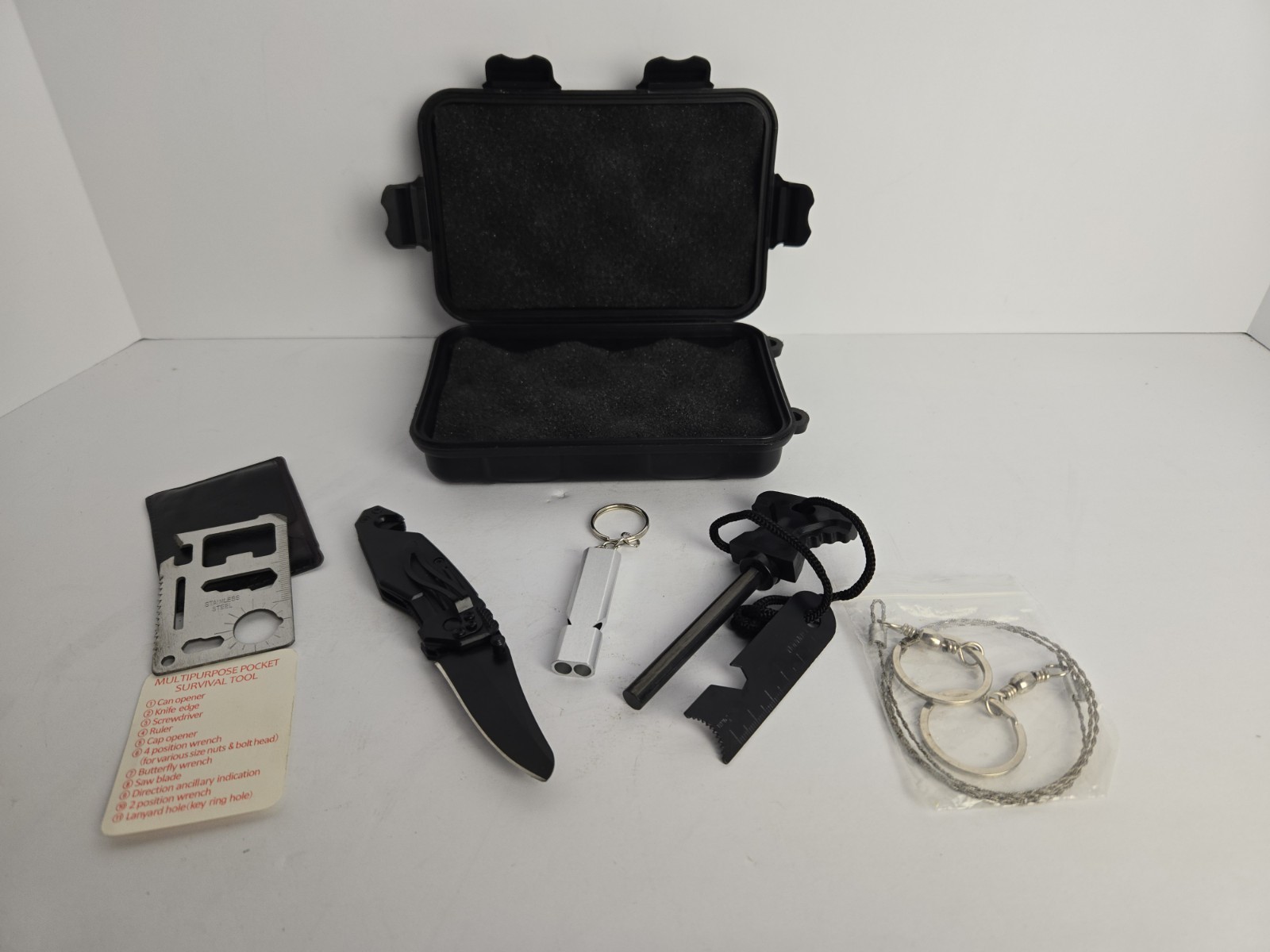 Survivor Tool Kit, Includes Fire Starter ,multi Tool ,knife ,whistle,cable Saw