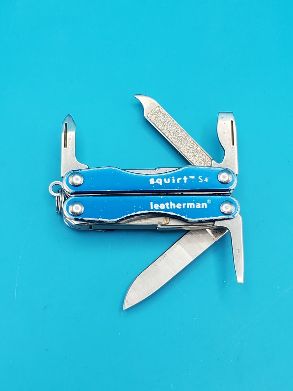 Leatherman “Squirt S4” Stainless Steel Multi Tool! BLUE!