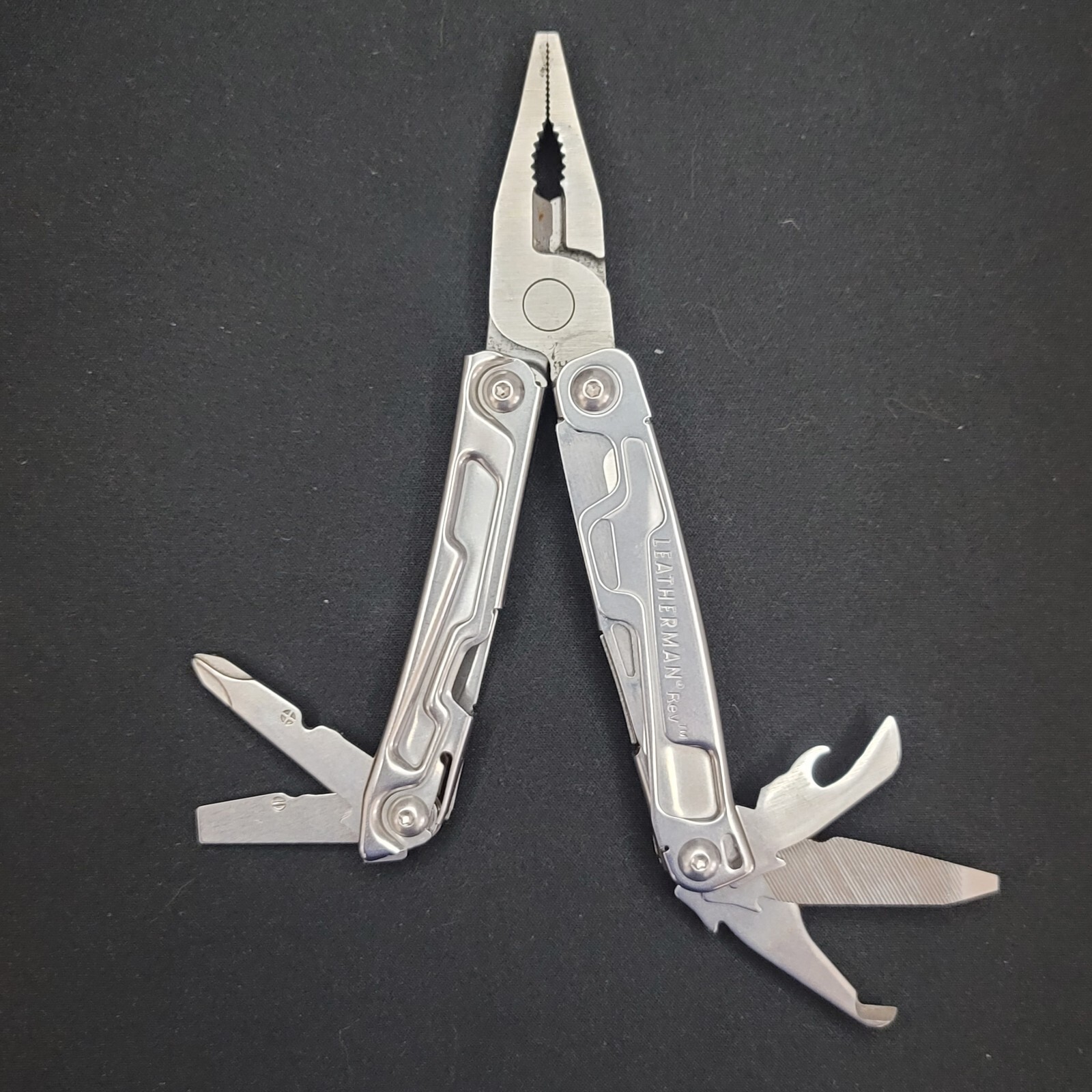 Leatherman Rev 3.8″ Stainless Steel Multi-Tool W/Carry Clip Very Nice USED Tool