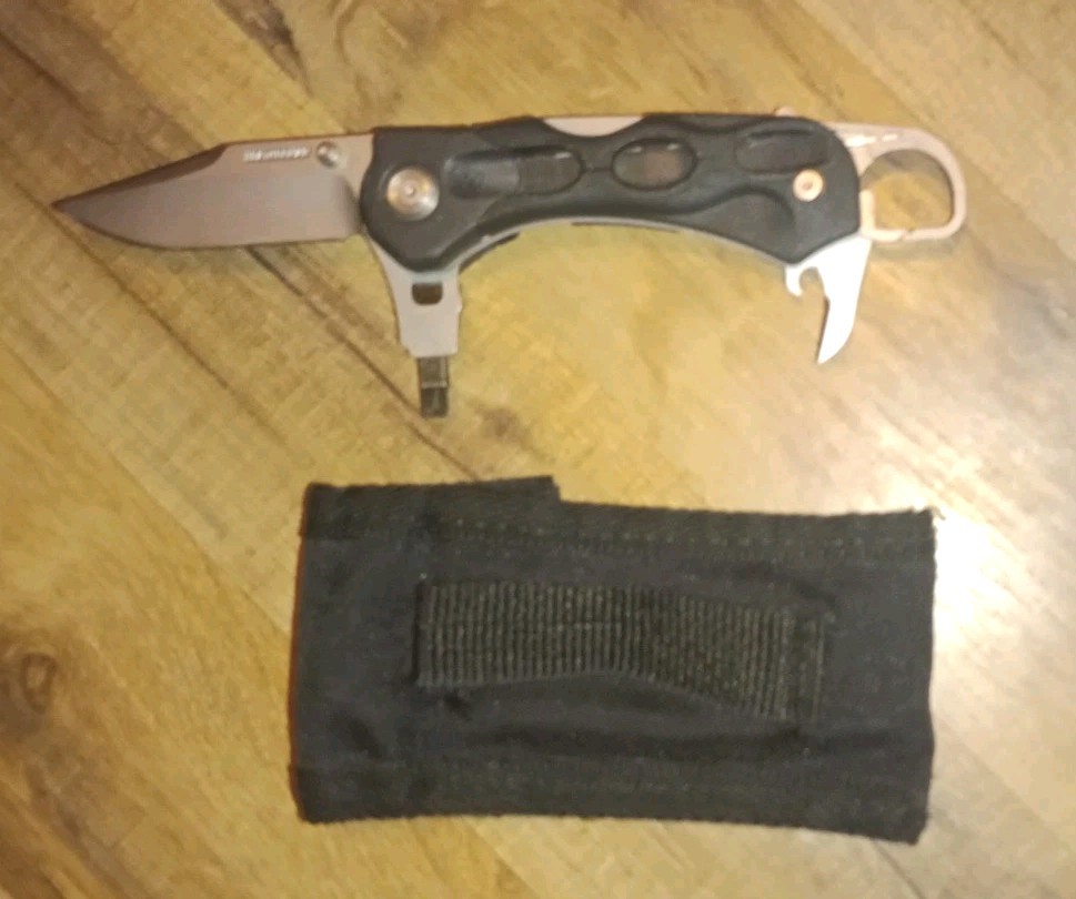 Leatherman H502 knife/multitool with sheath Retired