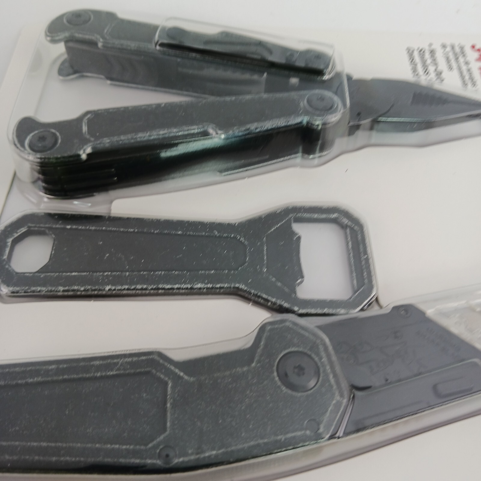 Multitool bundle w/ box knife & bottle opener. Black metal. Camping / Emergency