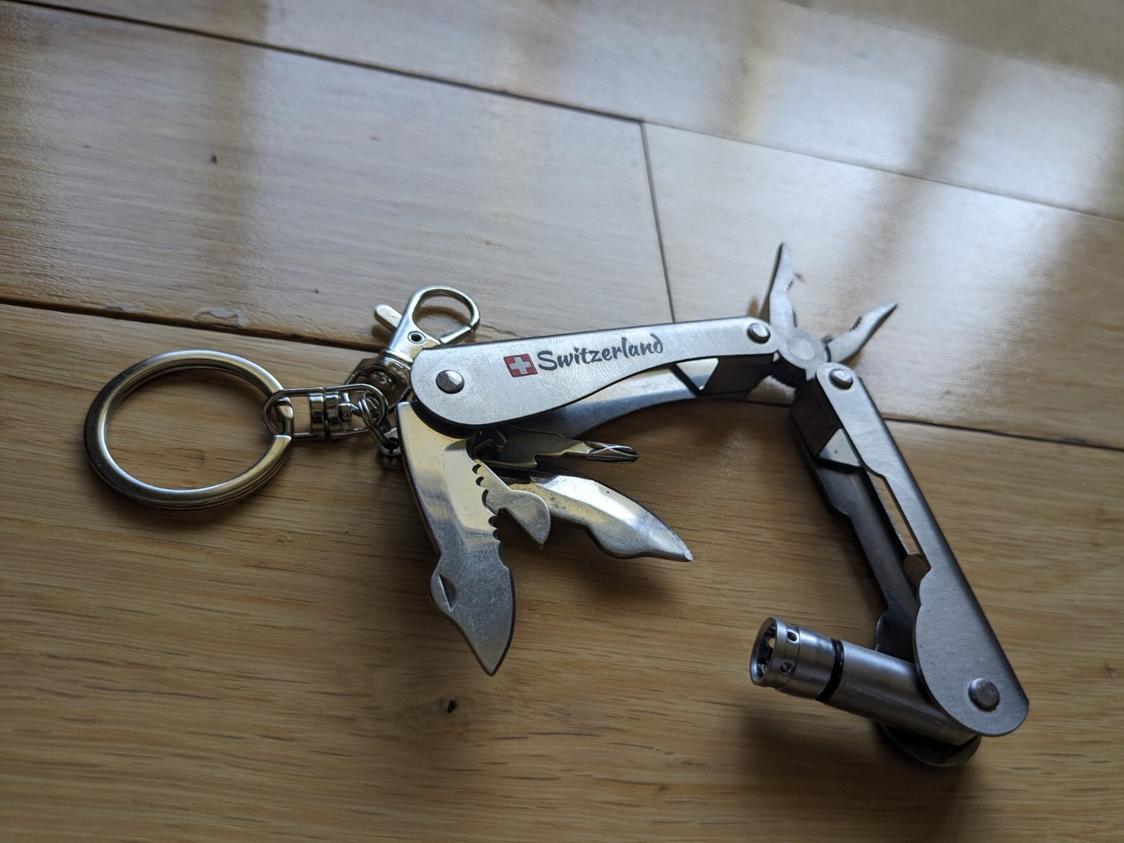 Swiss-Made Foldable Pocket Multi-Tool Stainless Steel w Pocket Clip. 8 Functions