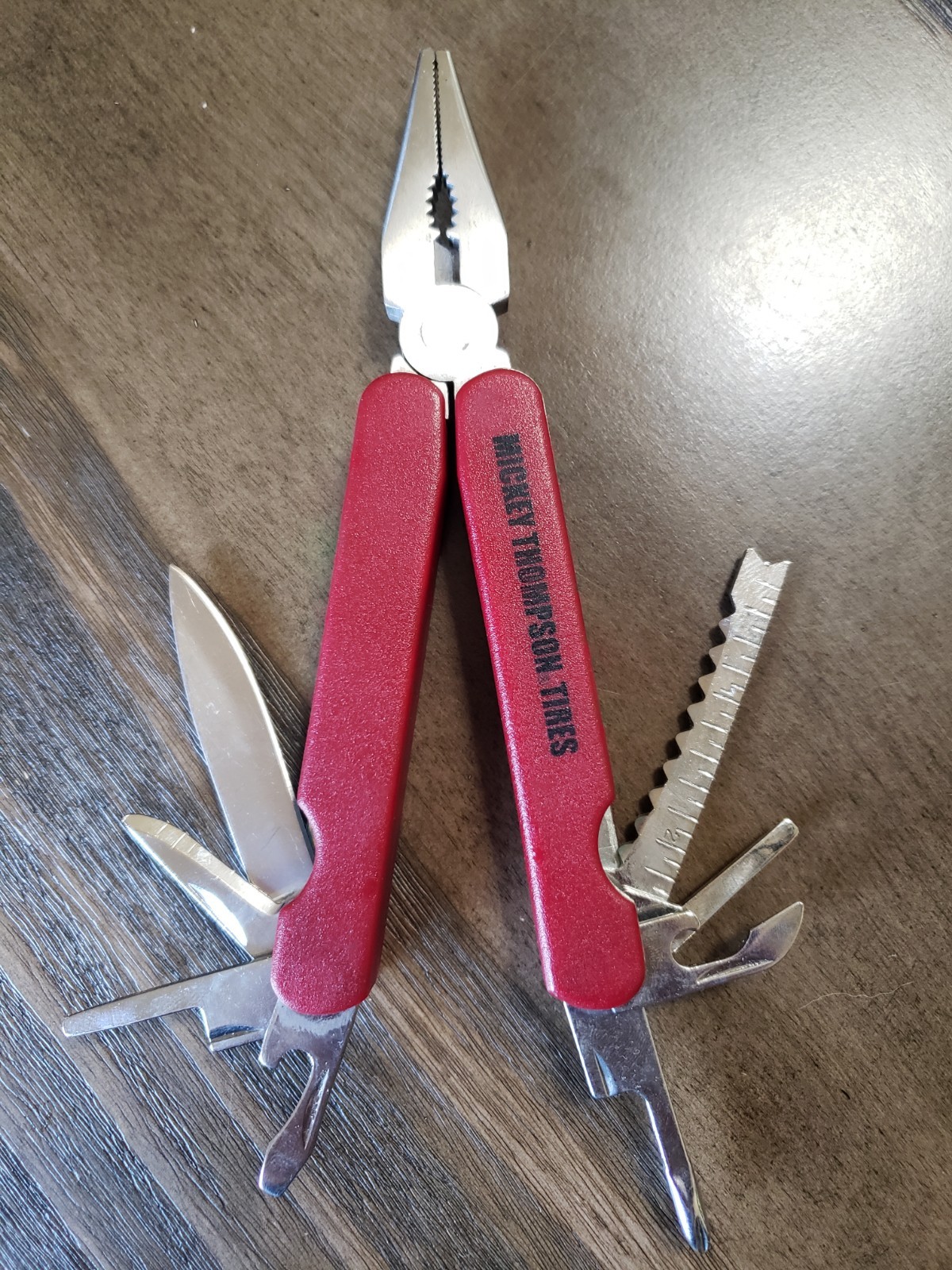 VINTAGE MICKEY THOMPSON TIRES BRANDED MULTI TOOL WITH CASE PLIERS KNIFE