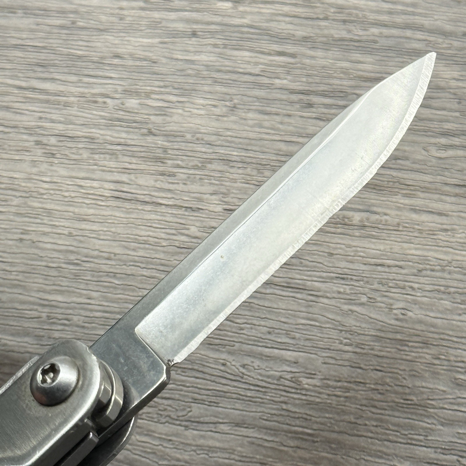 Leatherman Sideclip multitool. Lightly used. Late Run: shiny factory polished