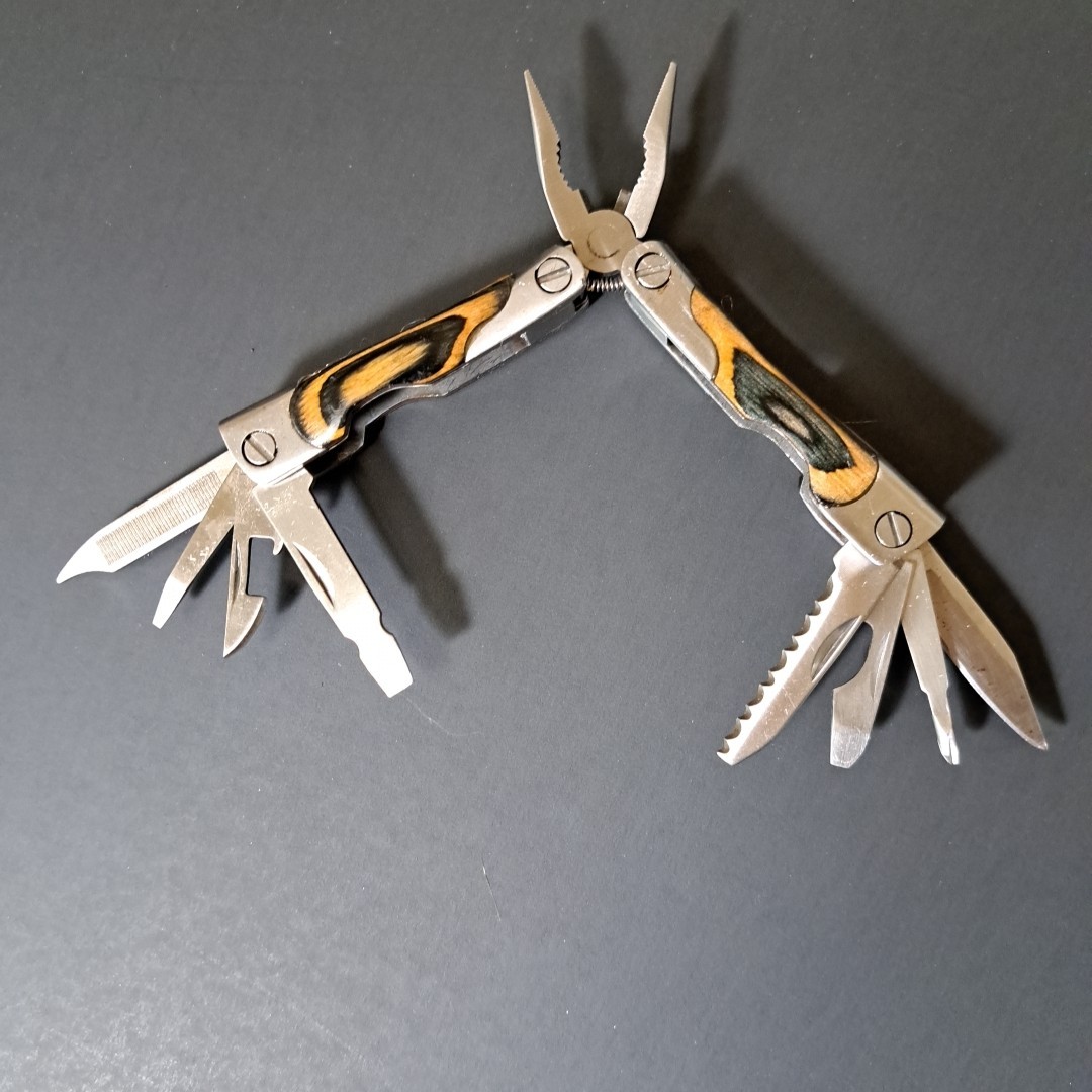 Multi tool With Laminated Wood Handles, Clean