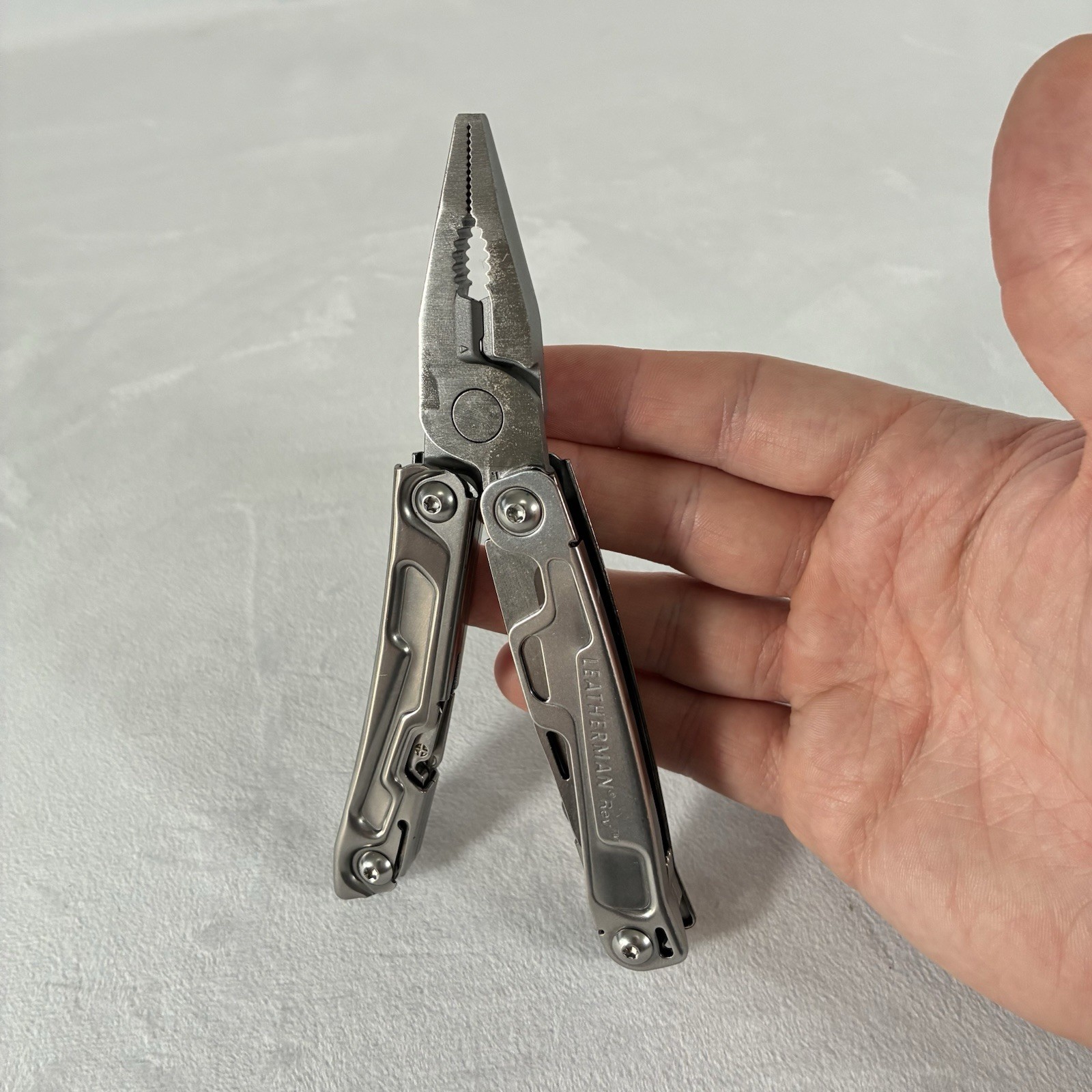 Leatherman Rev Stainless Steel 14-Tool Multi-Tool Pocket Knife w/ Pocket Clip