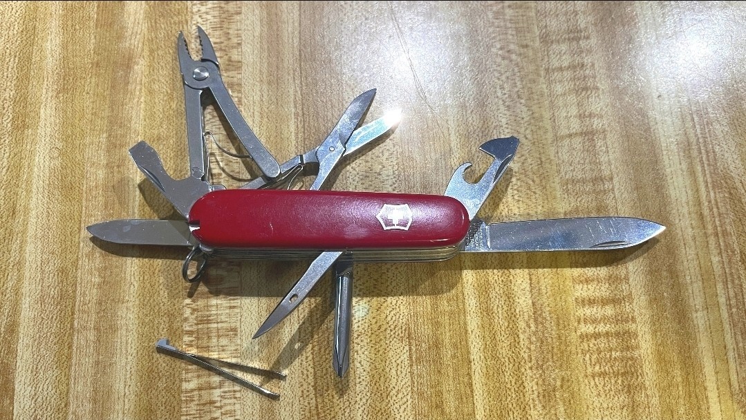 Victorinox Swiss Army Knife With Pliers And Scissors..Spare Toothpicks as well;)