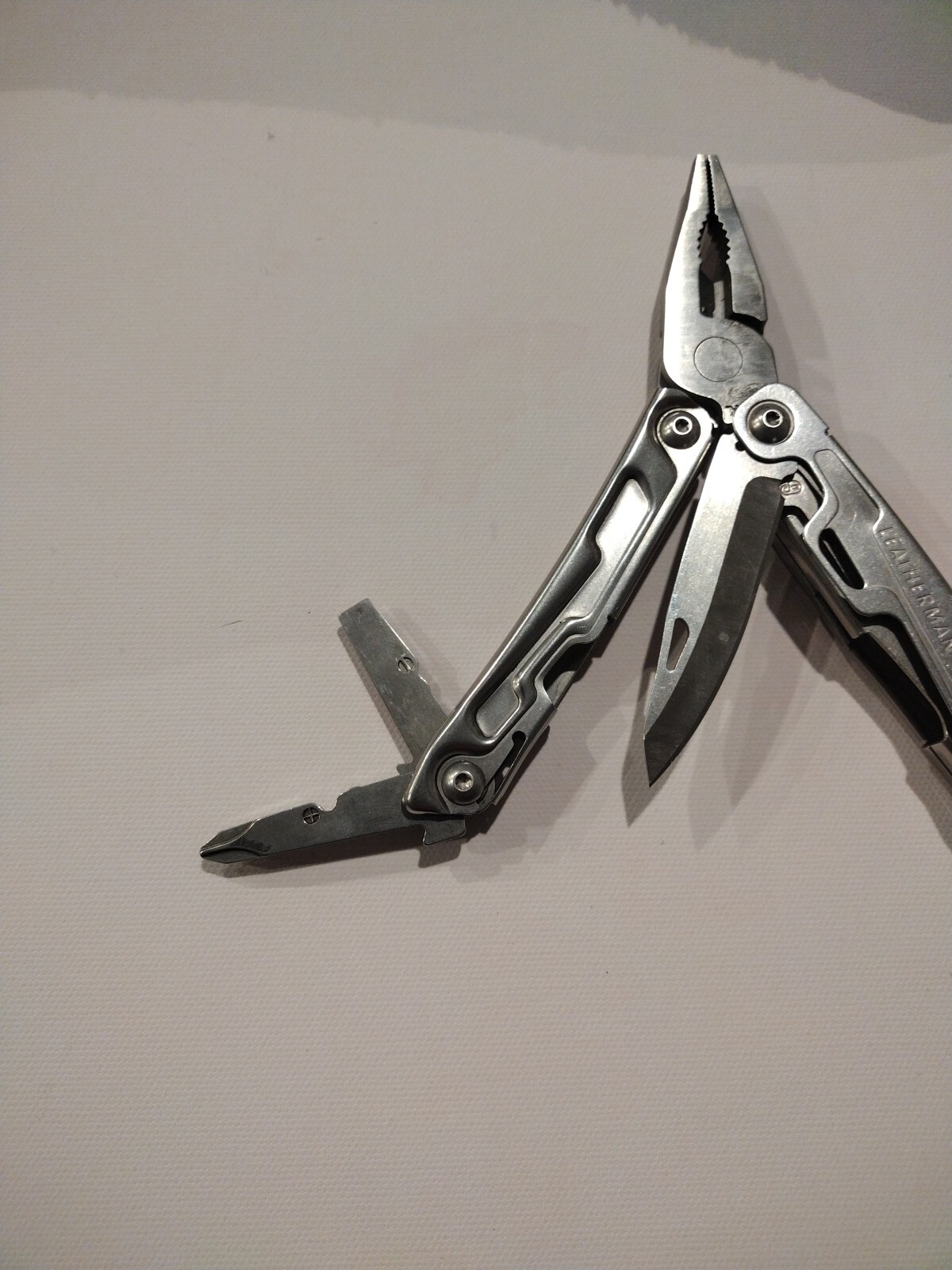 Leatherman REV 14 Tools Multi-Tool – Stainless Steel with Nylon Sheath Excellent