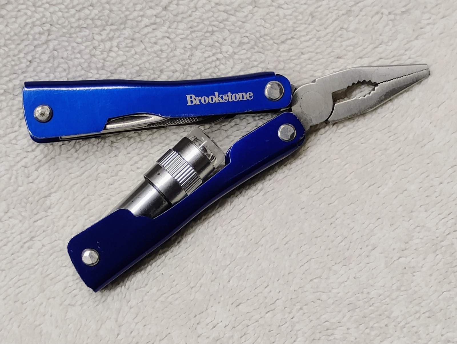 Brookstone Pocket Knife Multi 7+ Function Tool Led Light Key Compact Mini Pliers