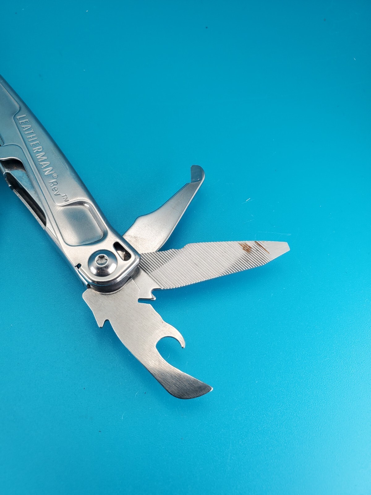 Leatherman Rev 3.8″ Multi-Tool, Stainless! *RUST ON ITEM*