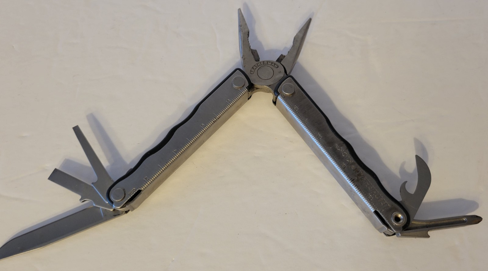 Leatherman Kick Multi-Tool Stainless Steel Knife, Pliers, Etc.