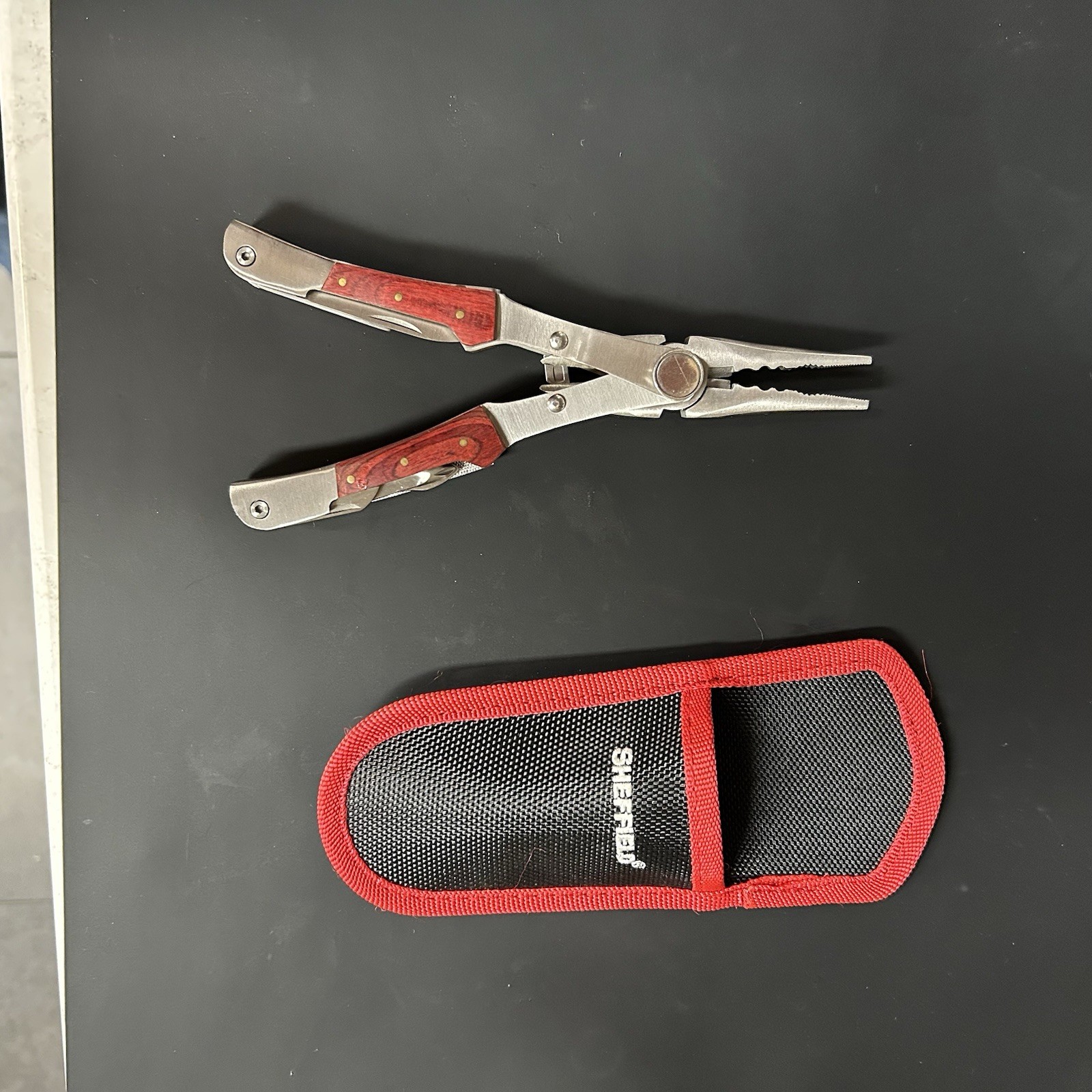 SHEFFIELD #12704 STAINLESS STEEL FOLDING PLIERS & MULTI TOOL KNIFE SAW