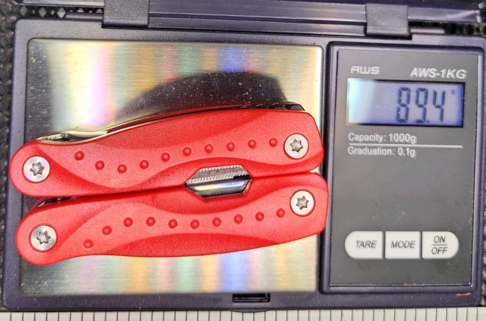 Small Multi tool With Needle Point Spring Plyers Red Used