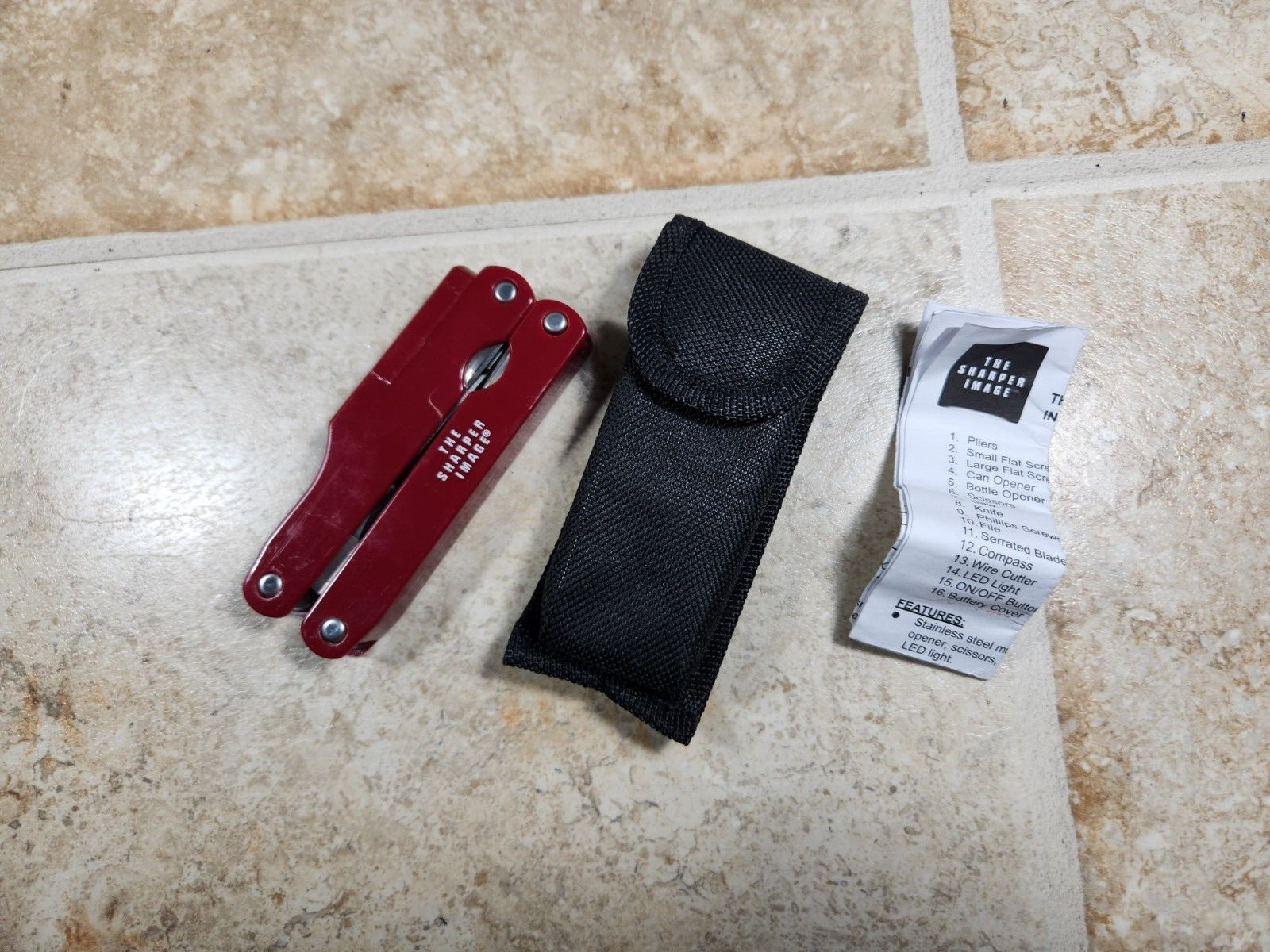 The Sharper Image Red Stainless Multi Tool Pliers Knife, Saw, Scissors w/ Sheath